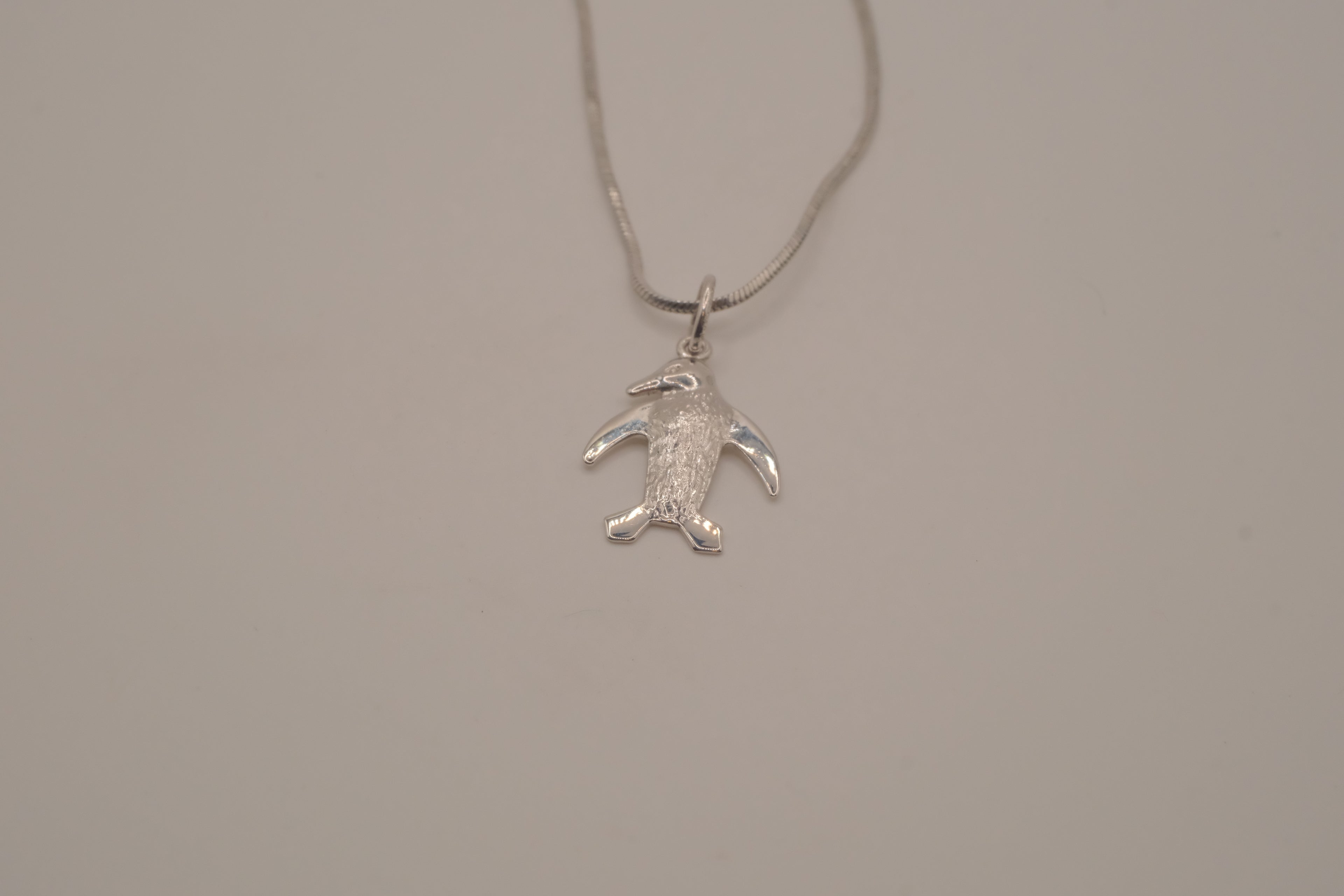 Sterling silver penguin pendant necklace