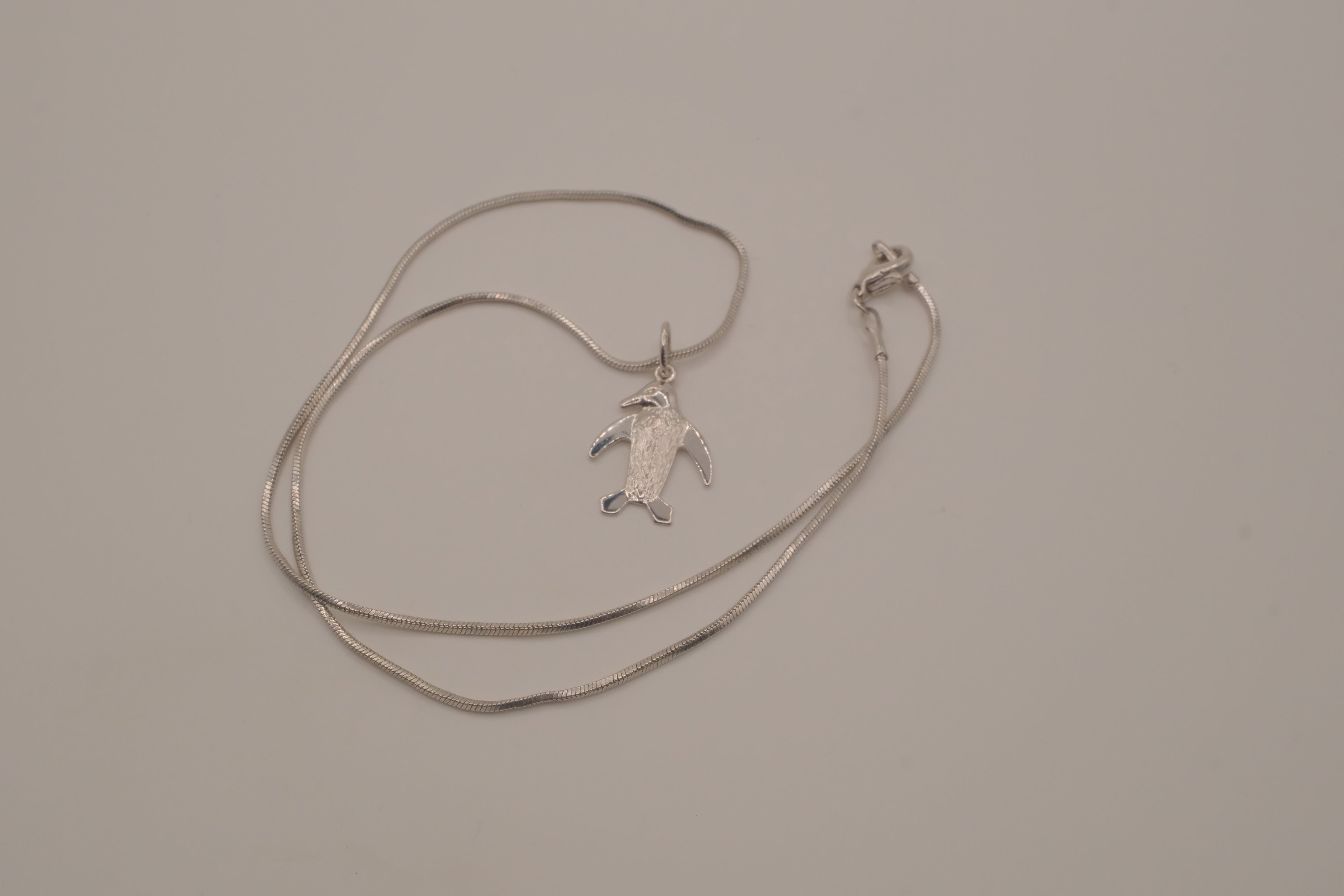 Sterling silver penguin pendant necklace