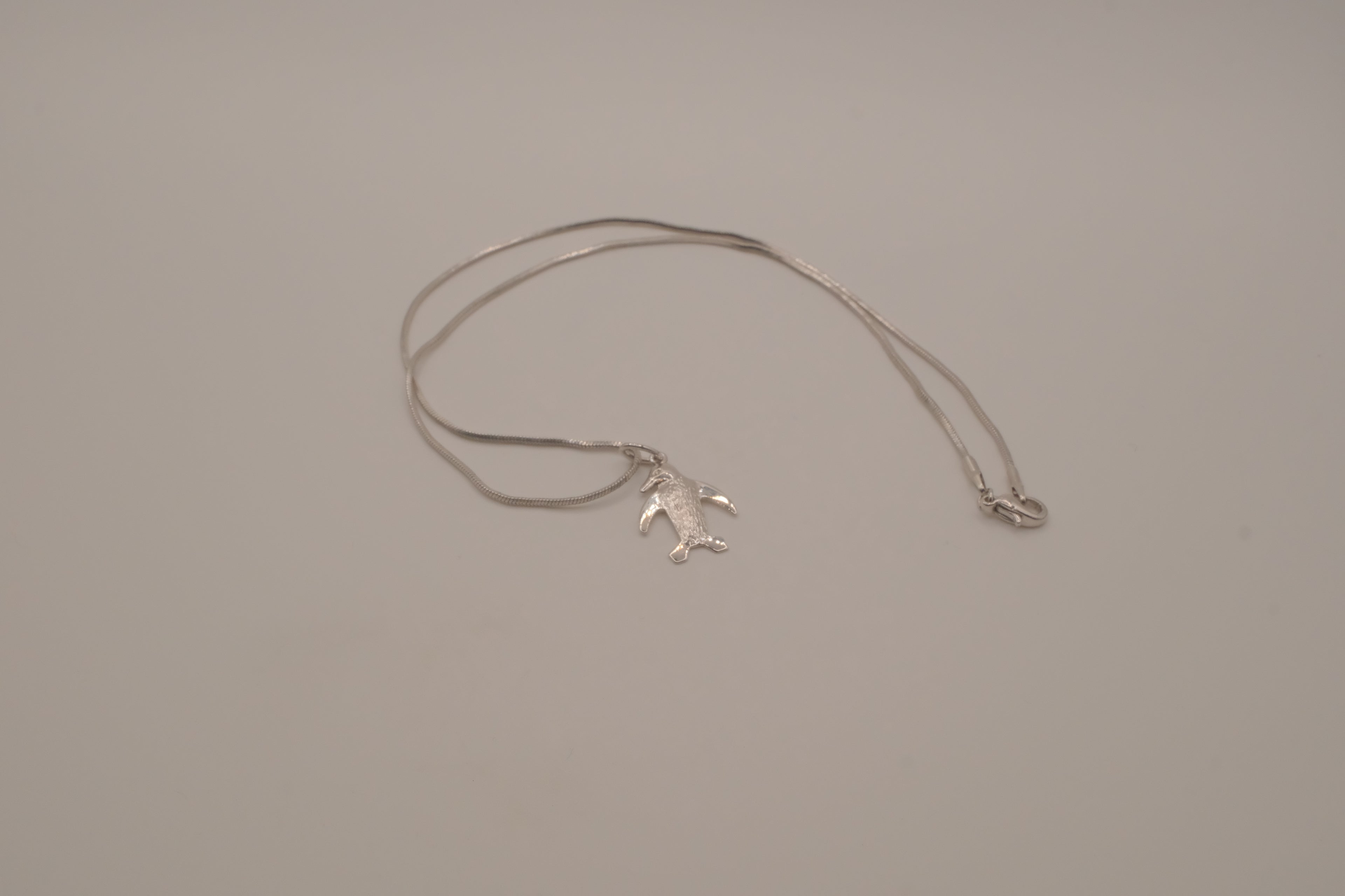 Sterling silver penguin pendant necklace