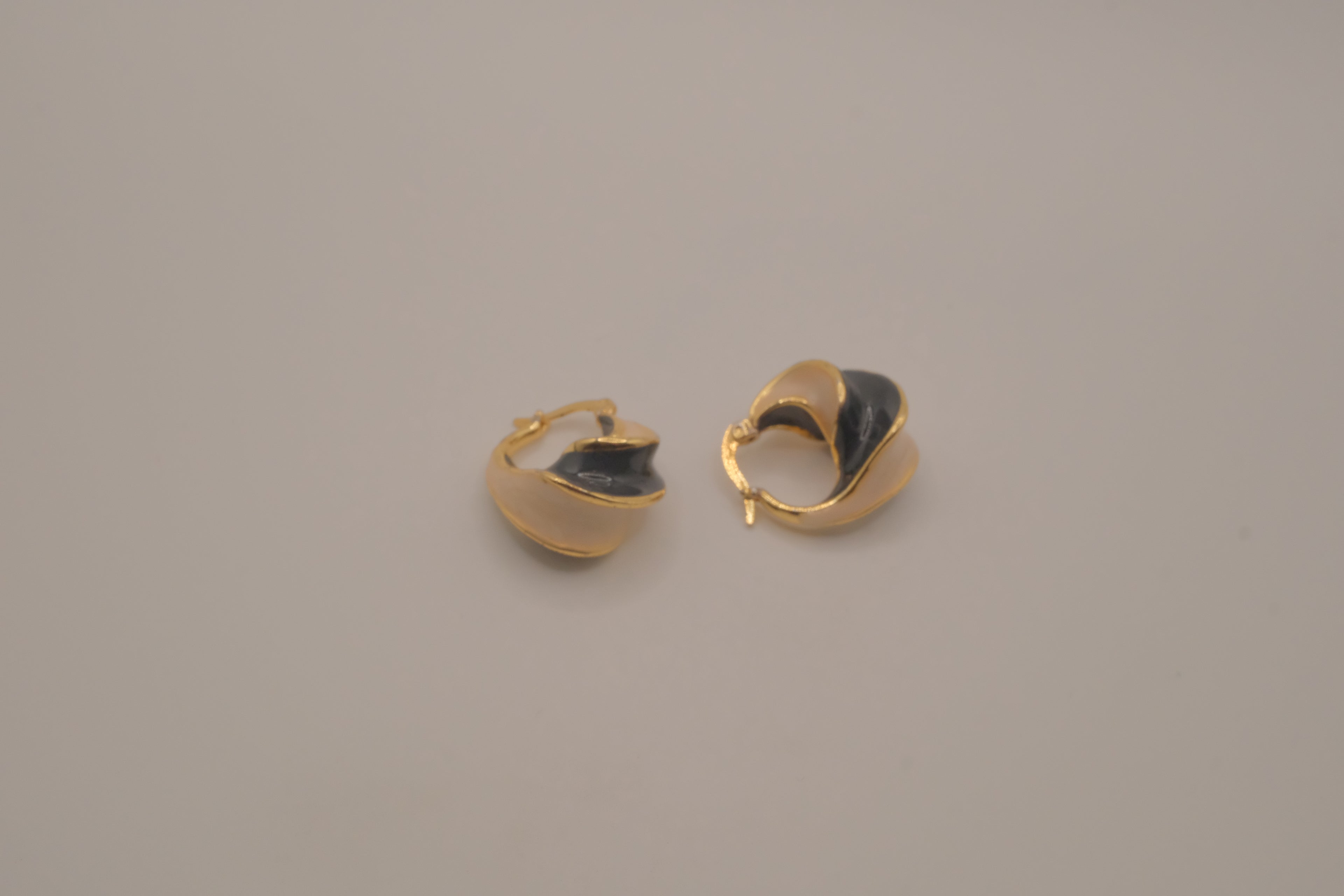 Vintage two-tone enamel twisted hoop earrings