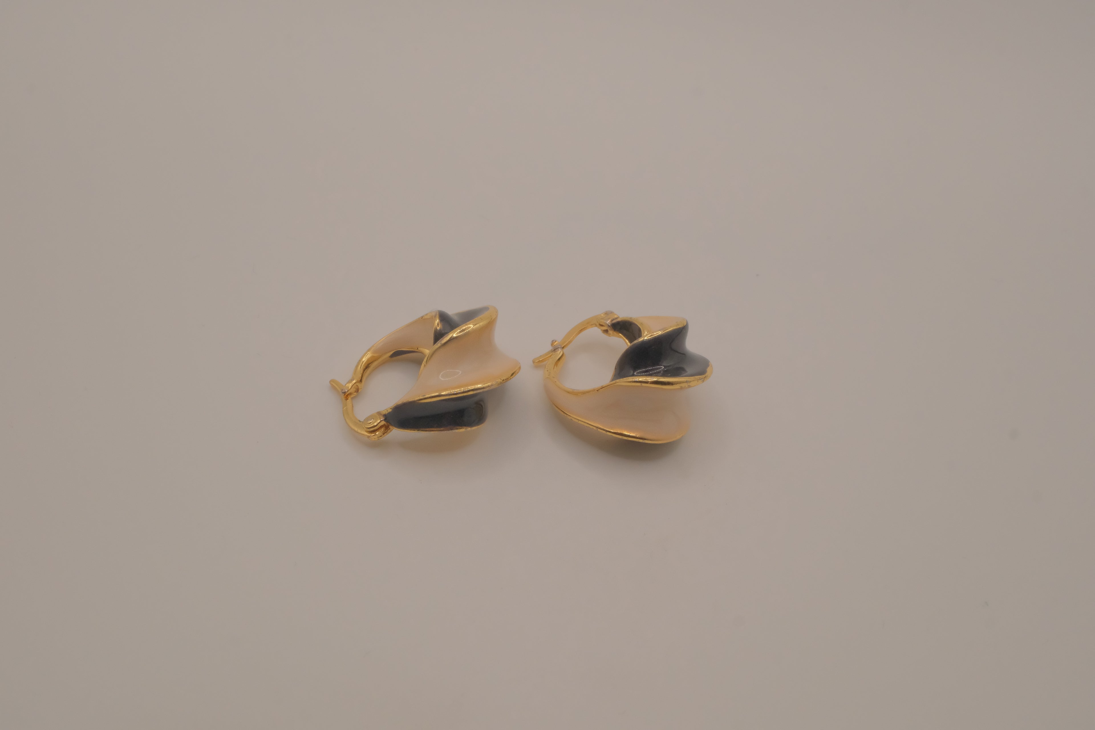 Vintage two-tone enamel twisted hoop earrings
