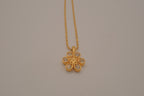 Gold flower pendant necklace