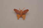 Hand-carved olive wood butterfly brooch