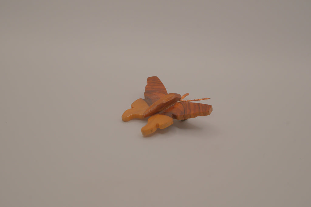Hand-carved olive wood butterfly brooch