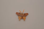 Hand-carved olive wood butterfly brooch