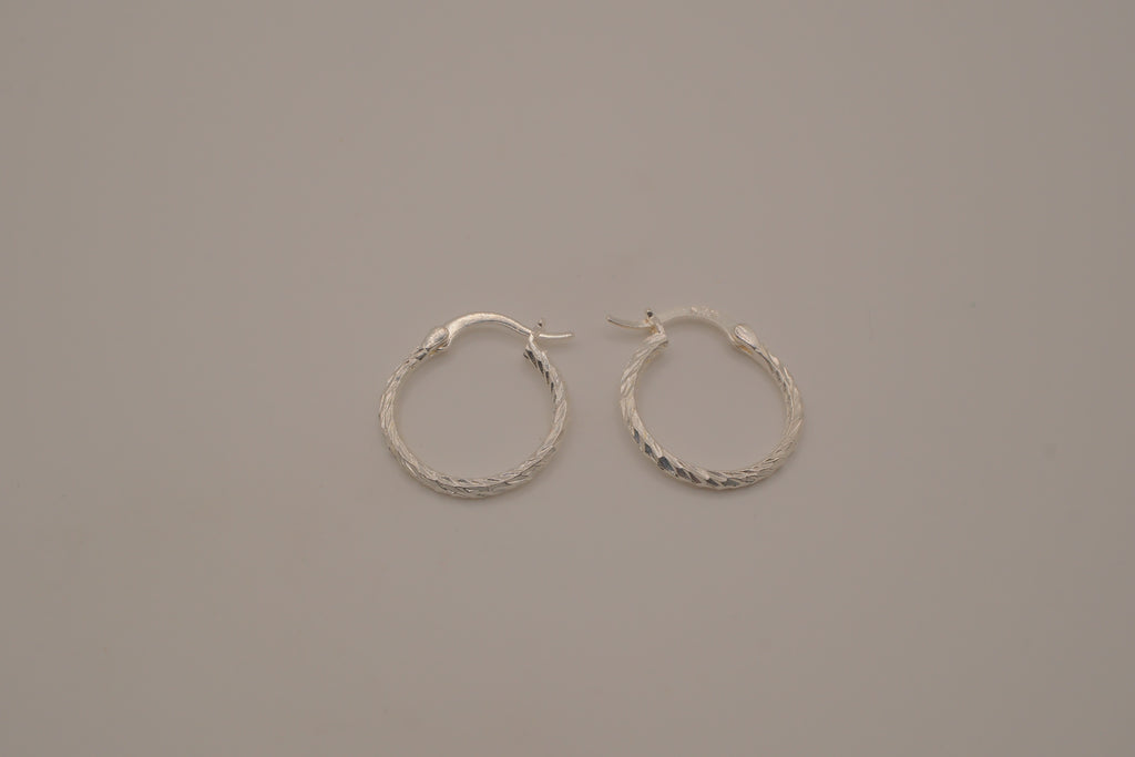 Diamond-cut sterling silver hoop earrings