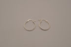 Diamond-cut sterling silver hoop earrings