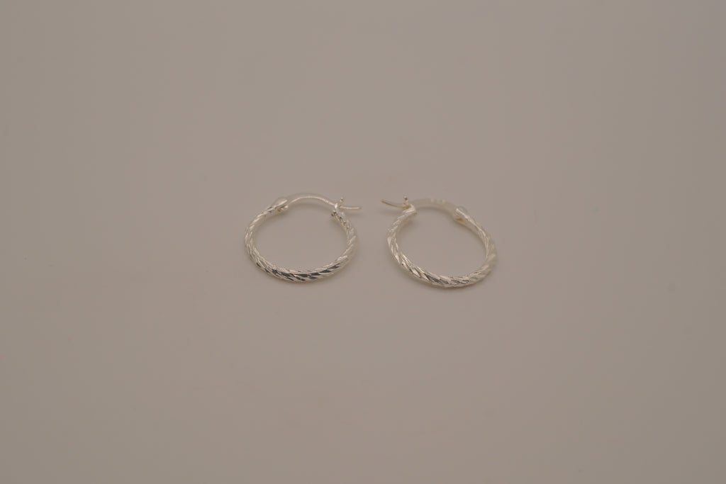 Diamond-cut sterling silver hoop earrings