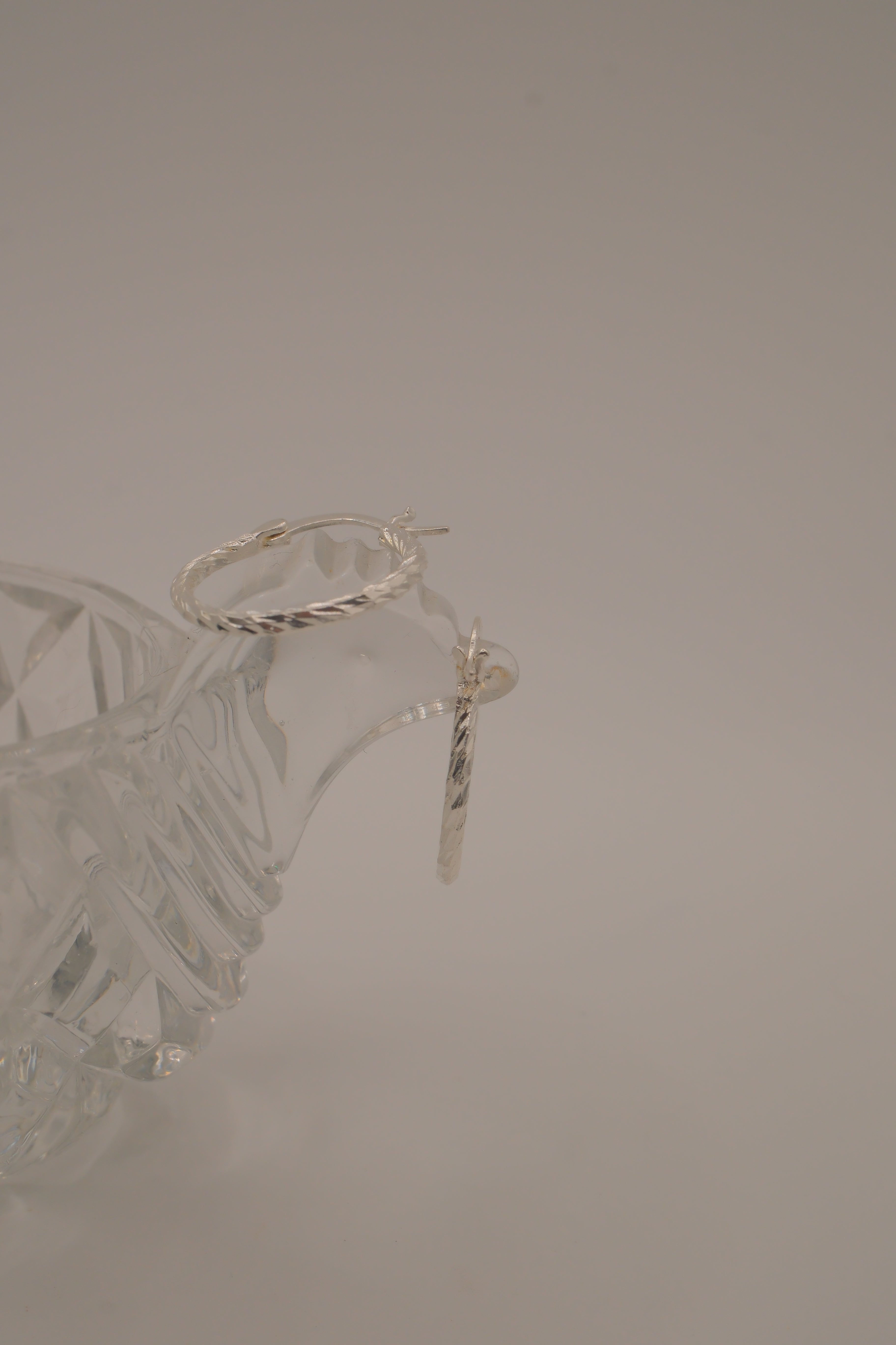 Diamond-cut sterling silver hoop earrings