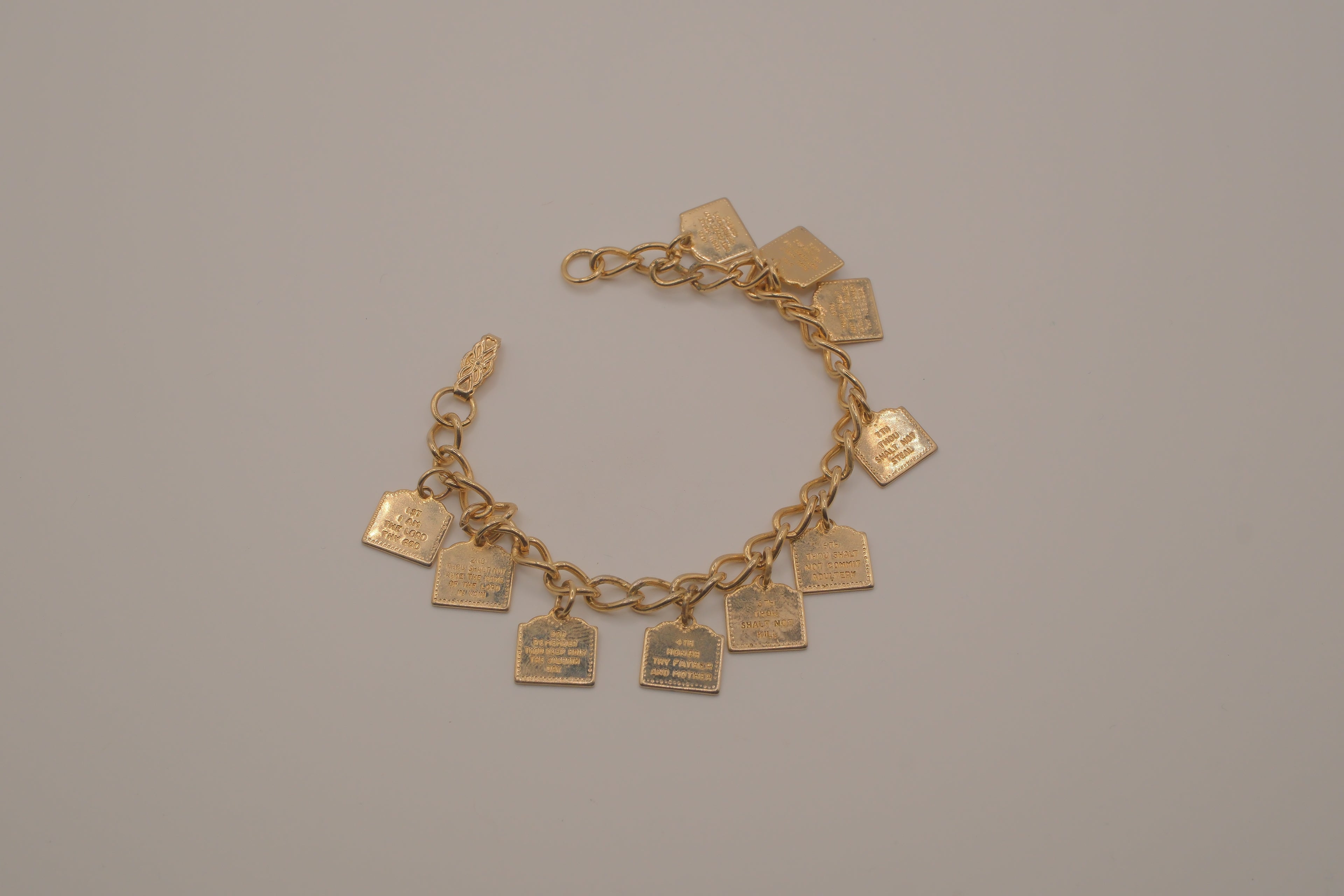 Vintage gold-tone Ten Commandments charm bracelet