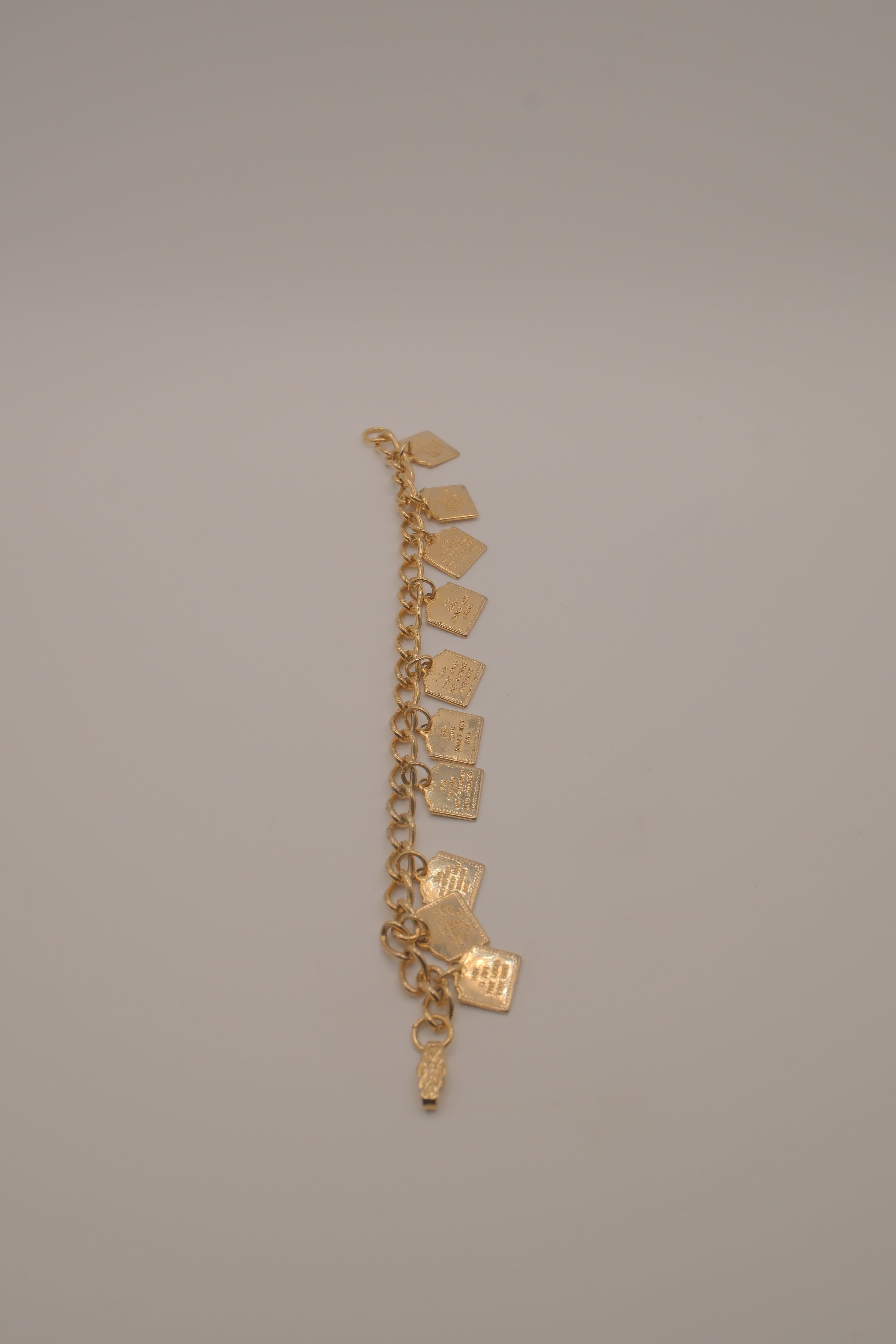 Vintage gold-tone Ten Commandments charm bracelet