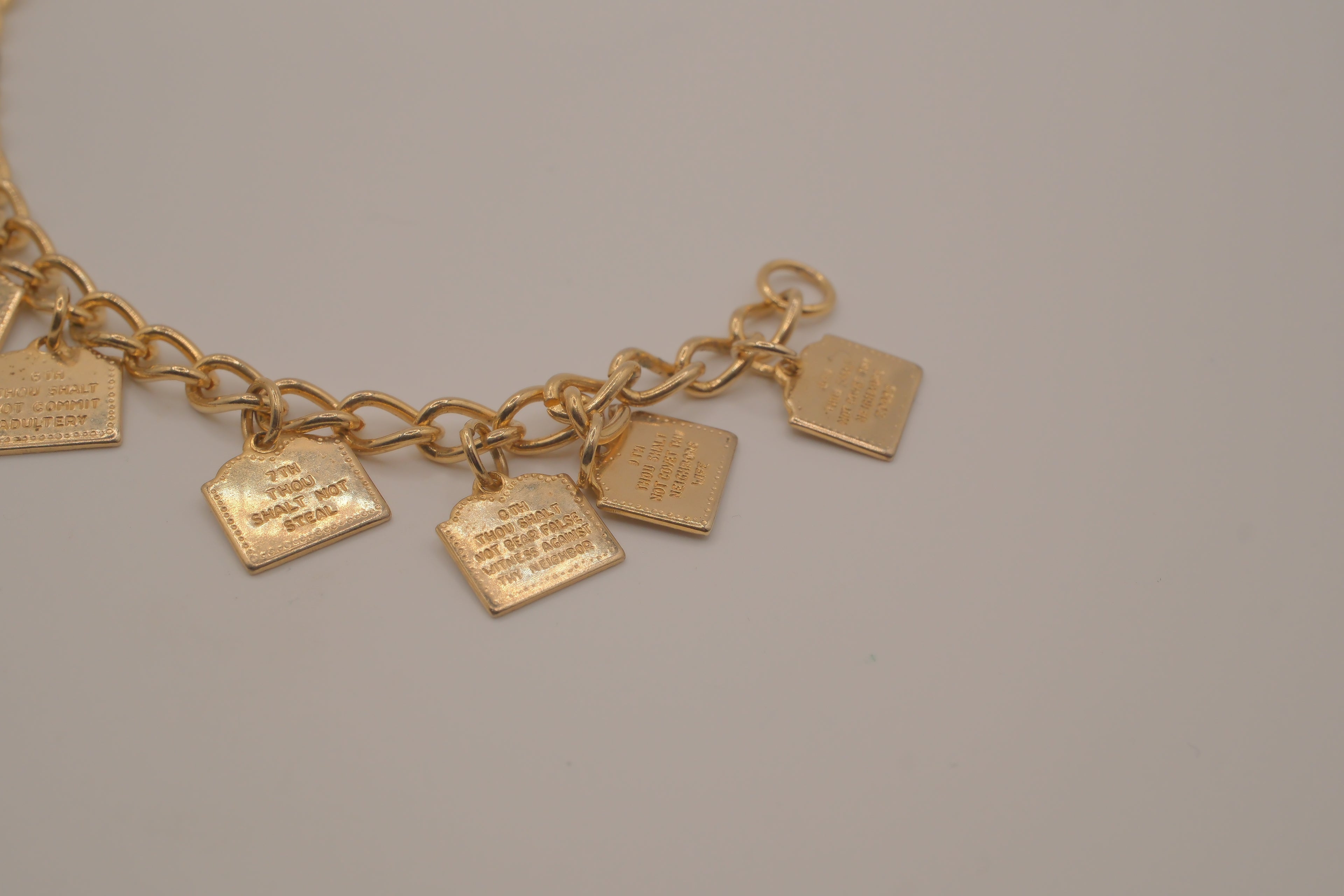 Vintage gold-tone Ten Commandments charm bracelet