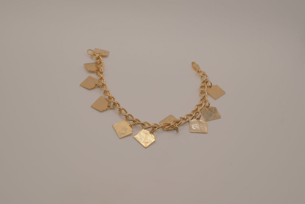 Vintage gold-tone Ten Commandments charm bracelet