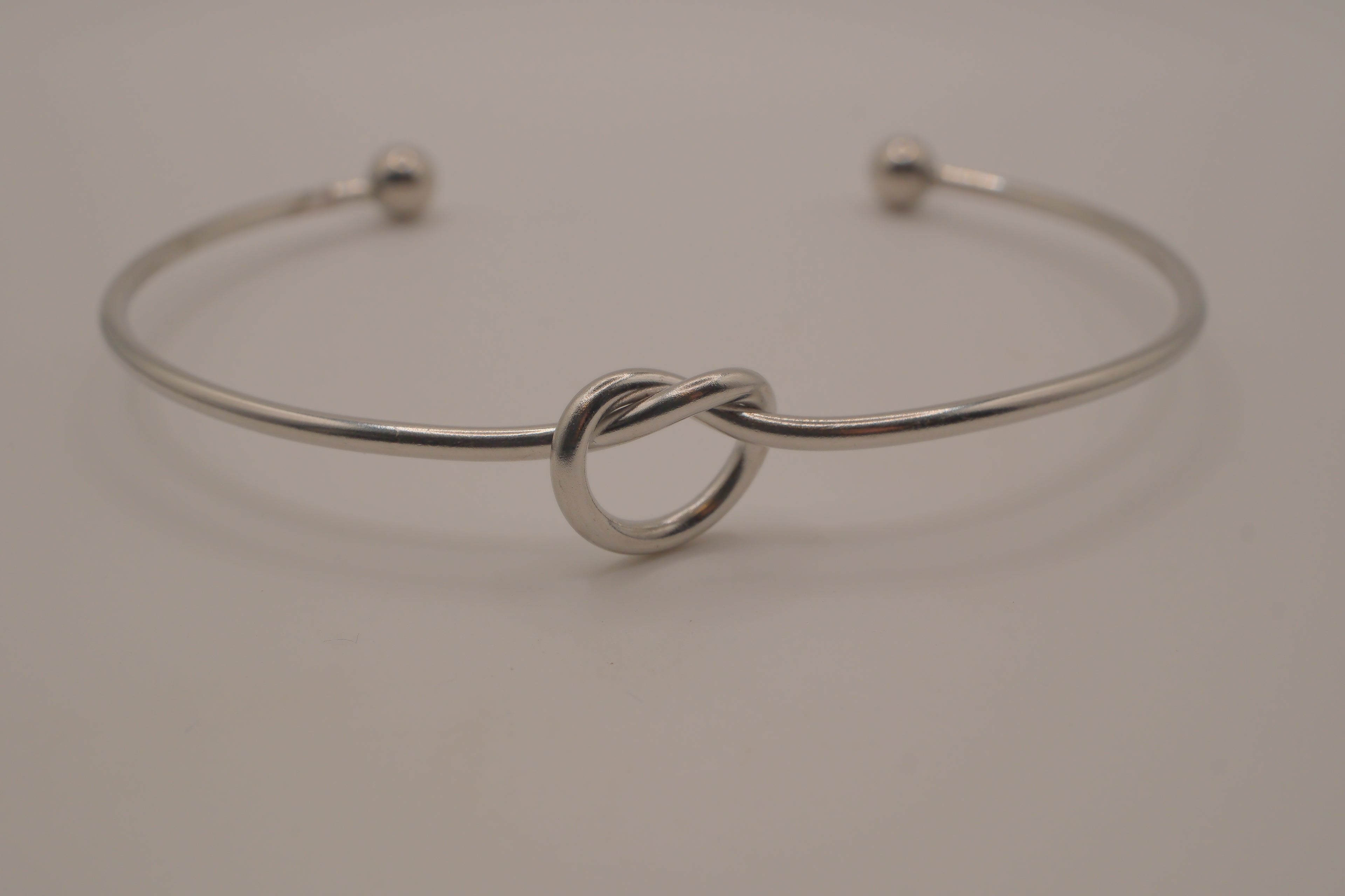 Minimalist silver love knot cuff bracelet