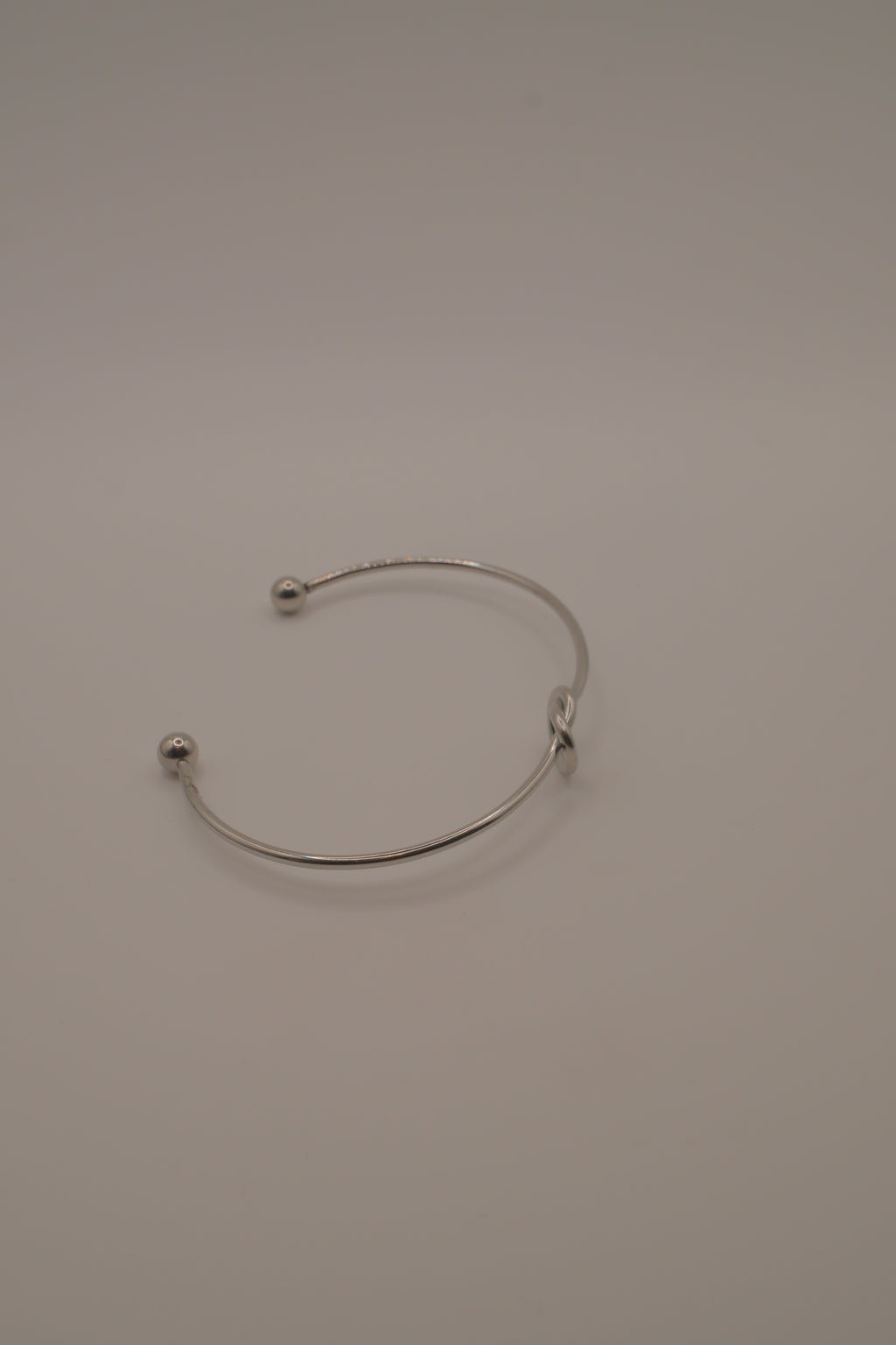 Minimalist silver love knot cuff bracelet
