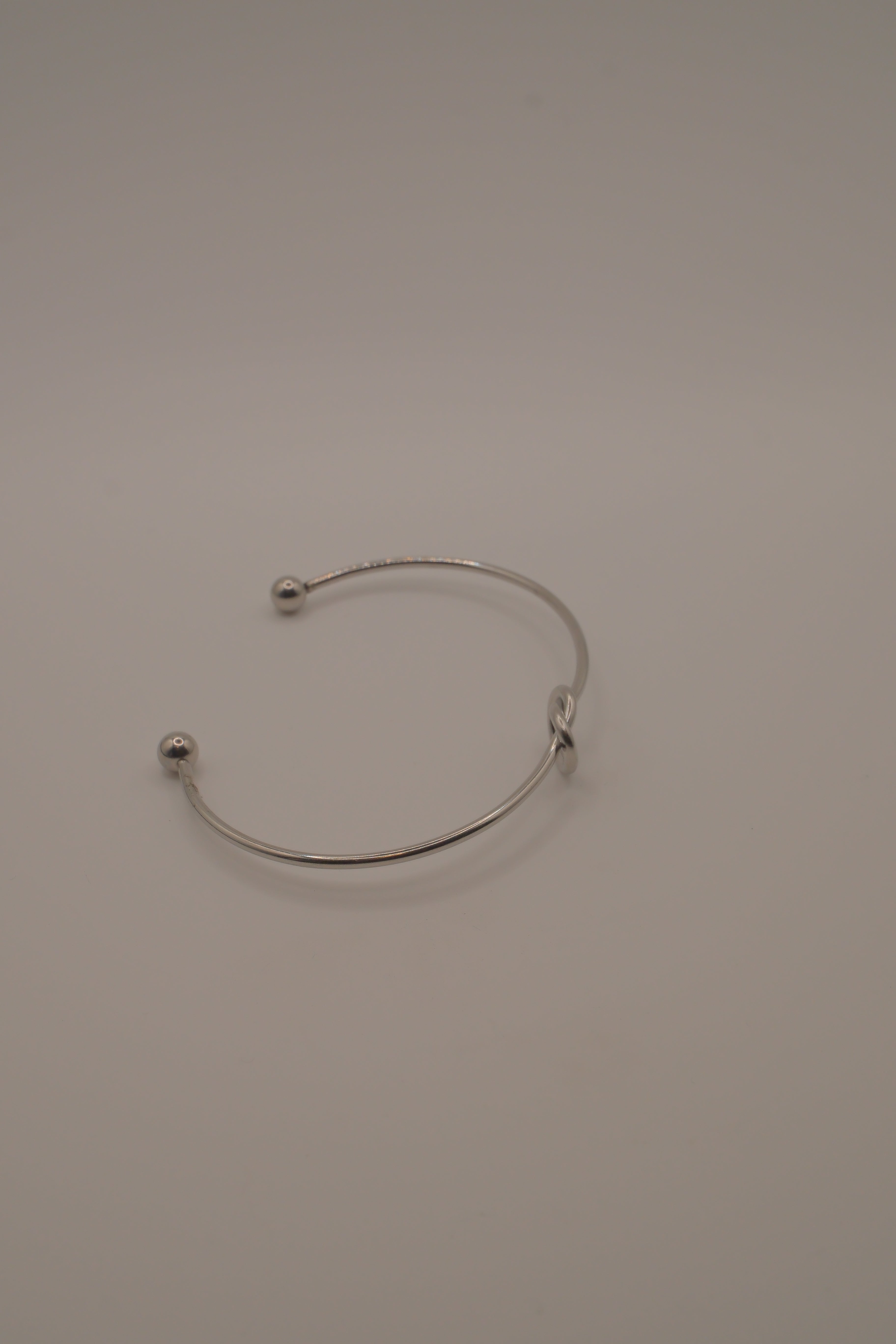 Minimalist silver love knot cuff bracelet