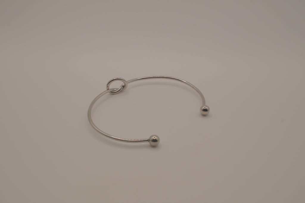 Minimalist silver love knot cuff bracelet