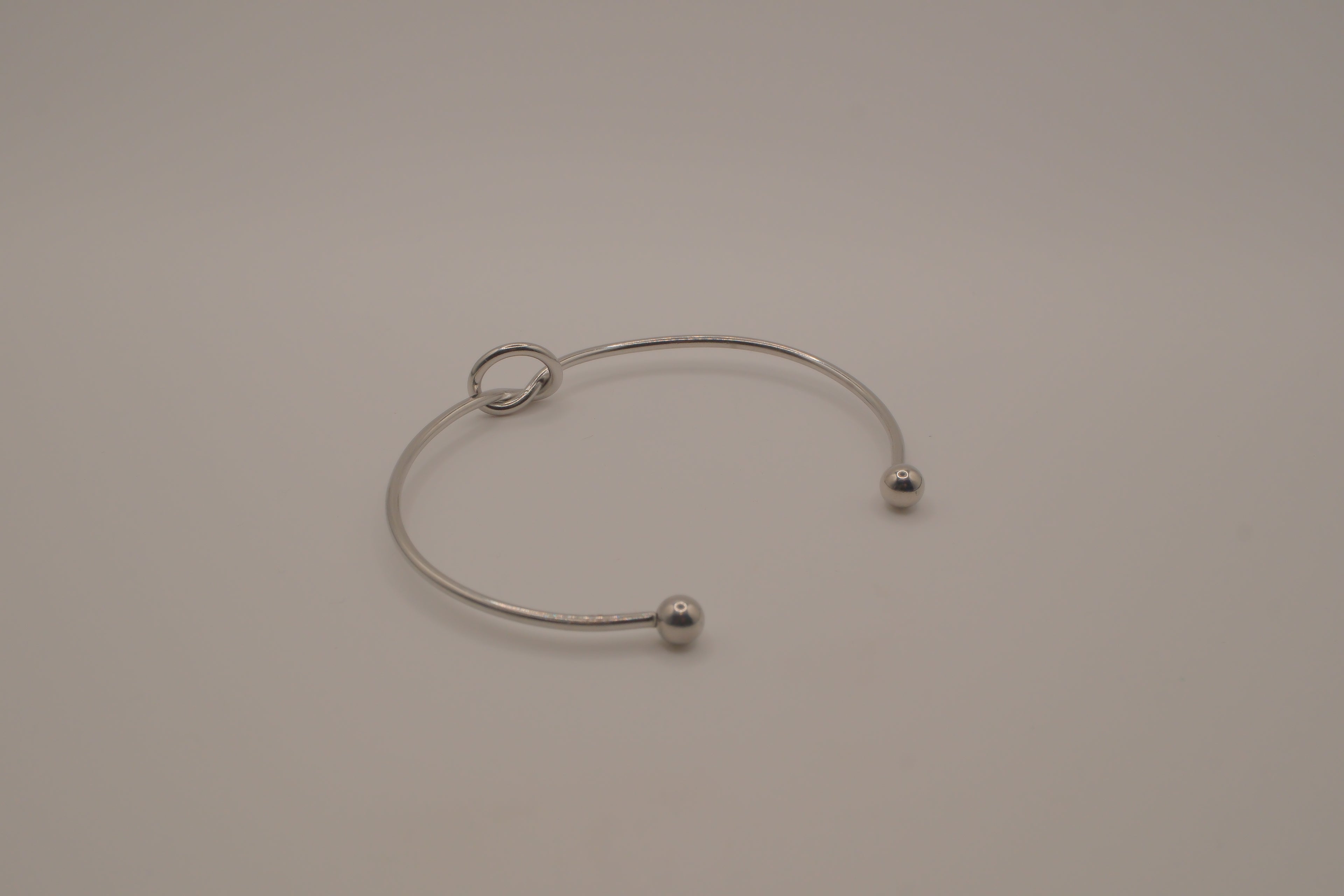 Minimalist silver love knot cuff bracelet