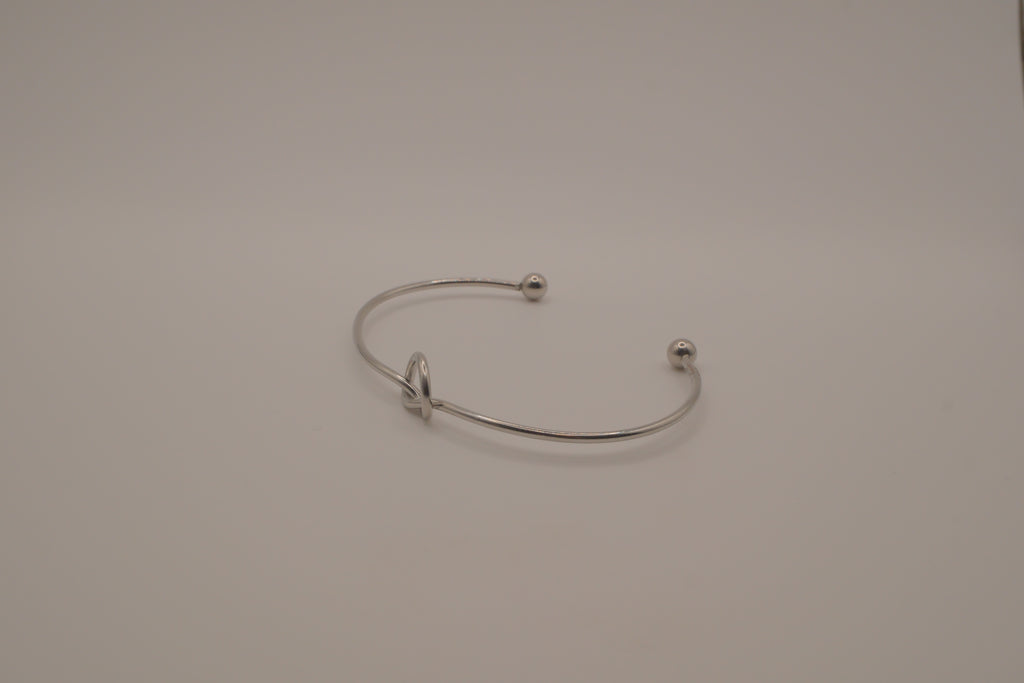 Minimalist silver love knot cuff bracelet