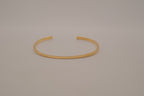 Avon minimalist gold-tone open cuff bracelet