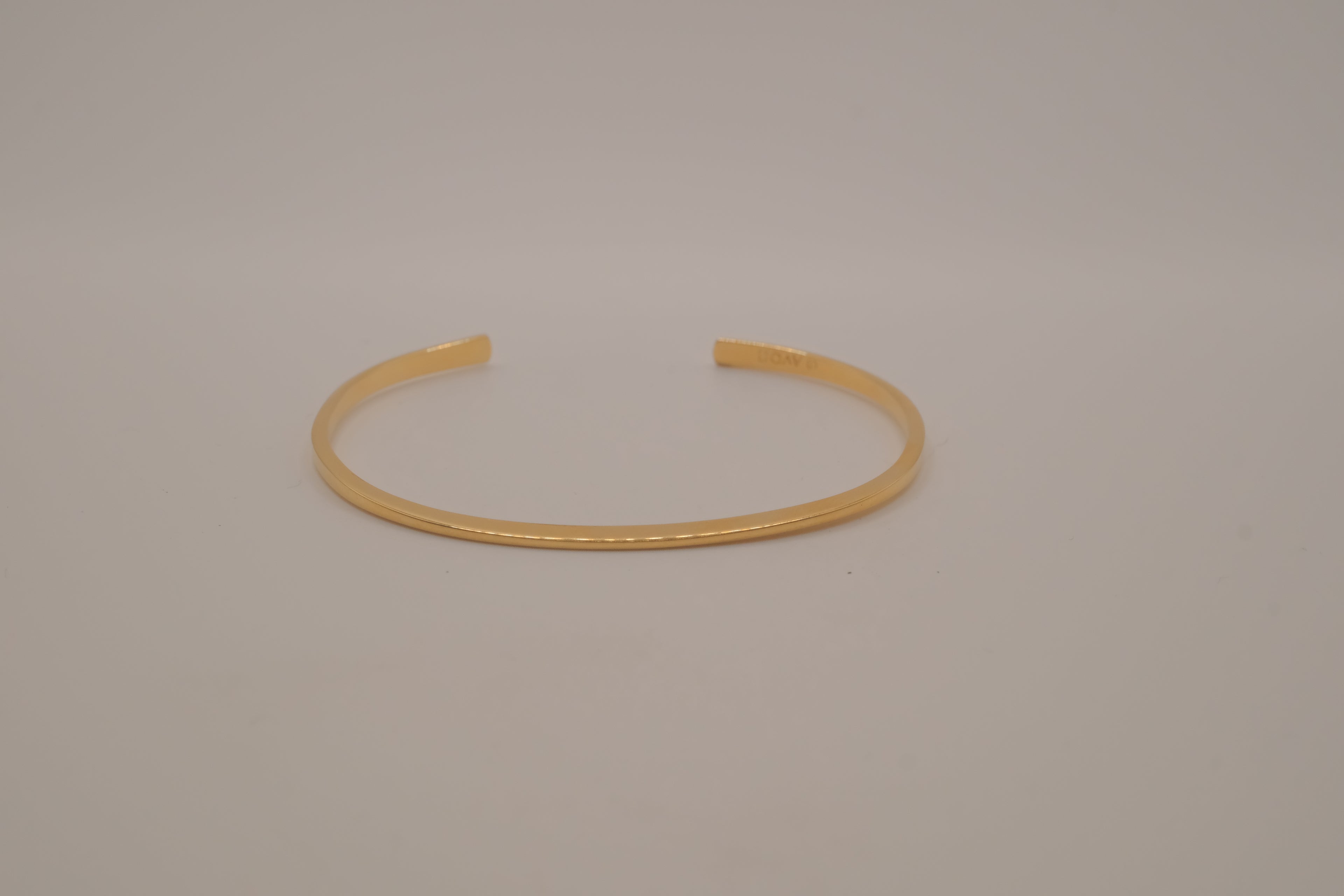 Avon minimalist gold-tone open cuff bracelet