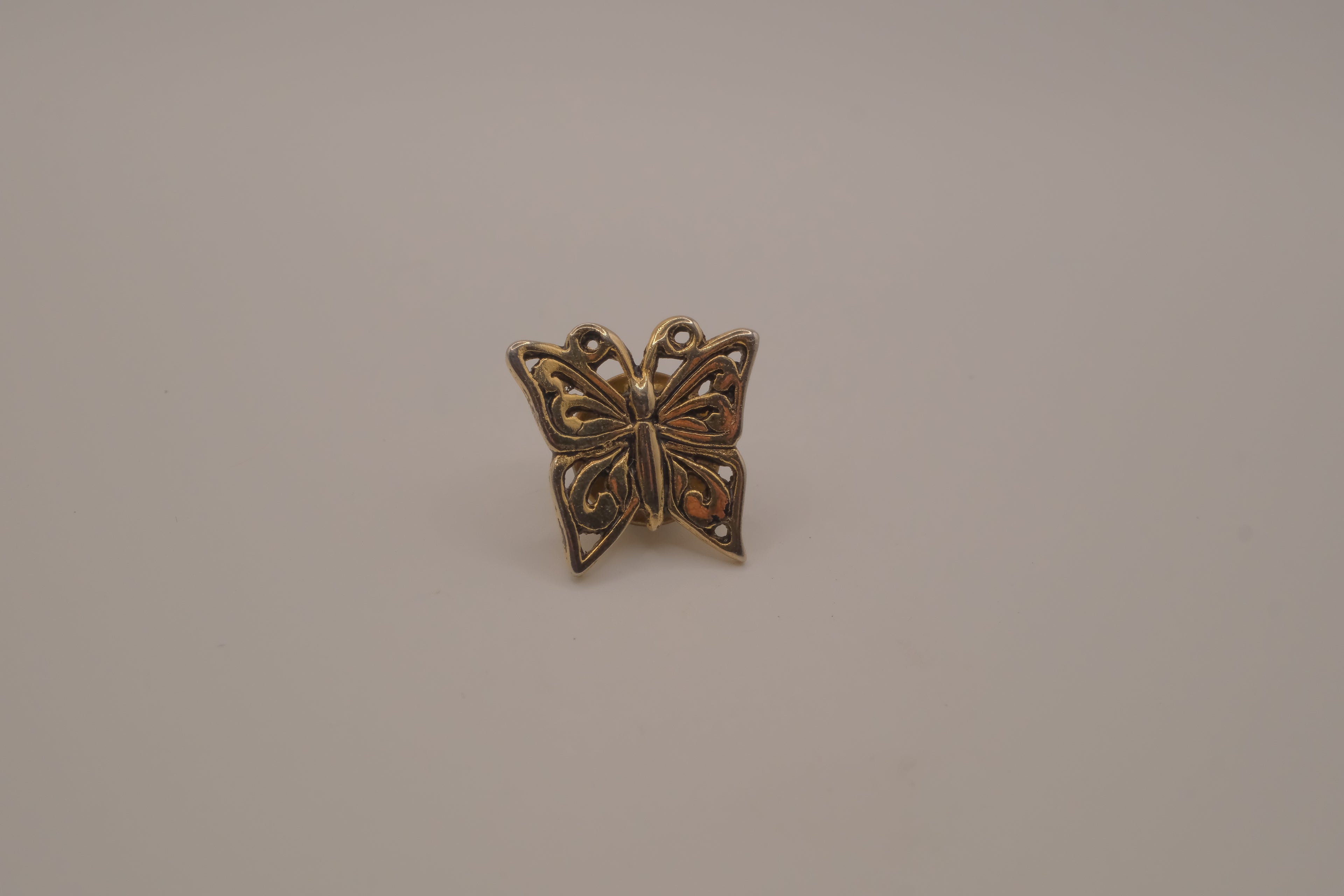 Antique gold butterfly bag pin