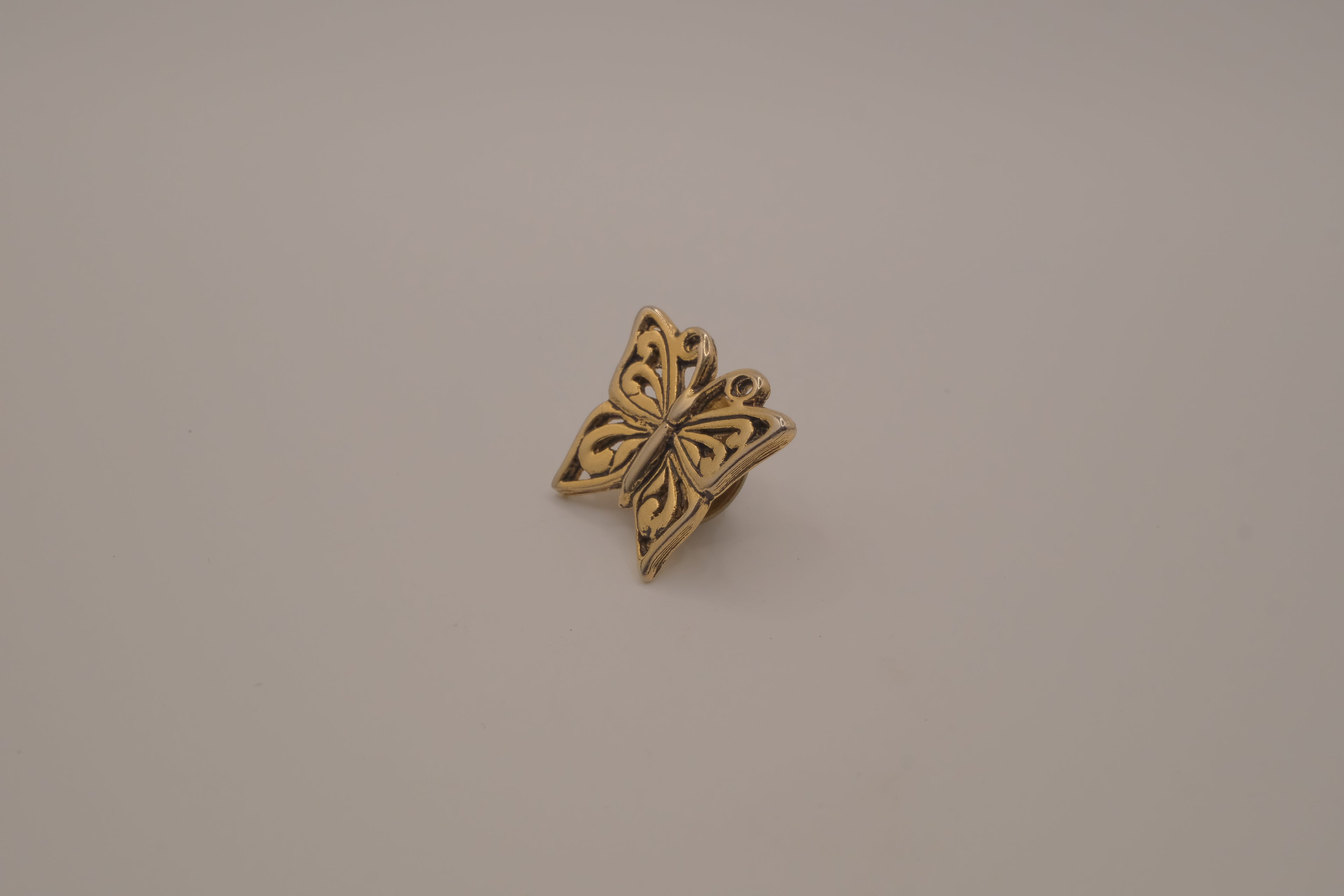 Antique gold butterfly bag pin
