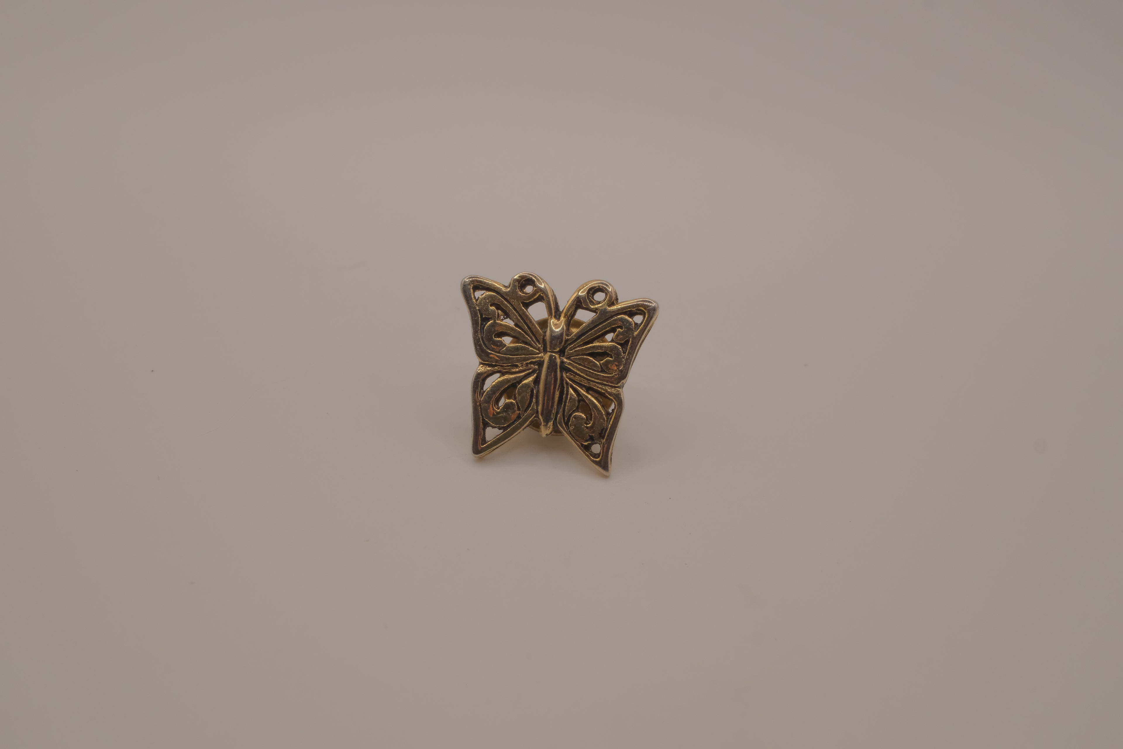 Antique gold butterfly bag pin