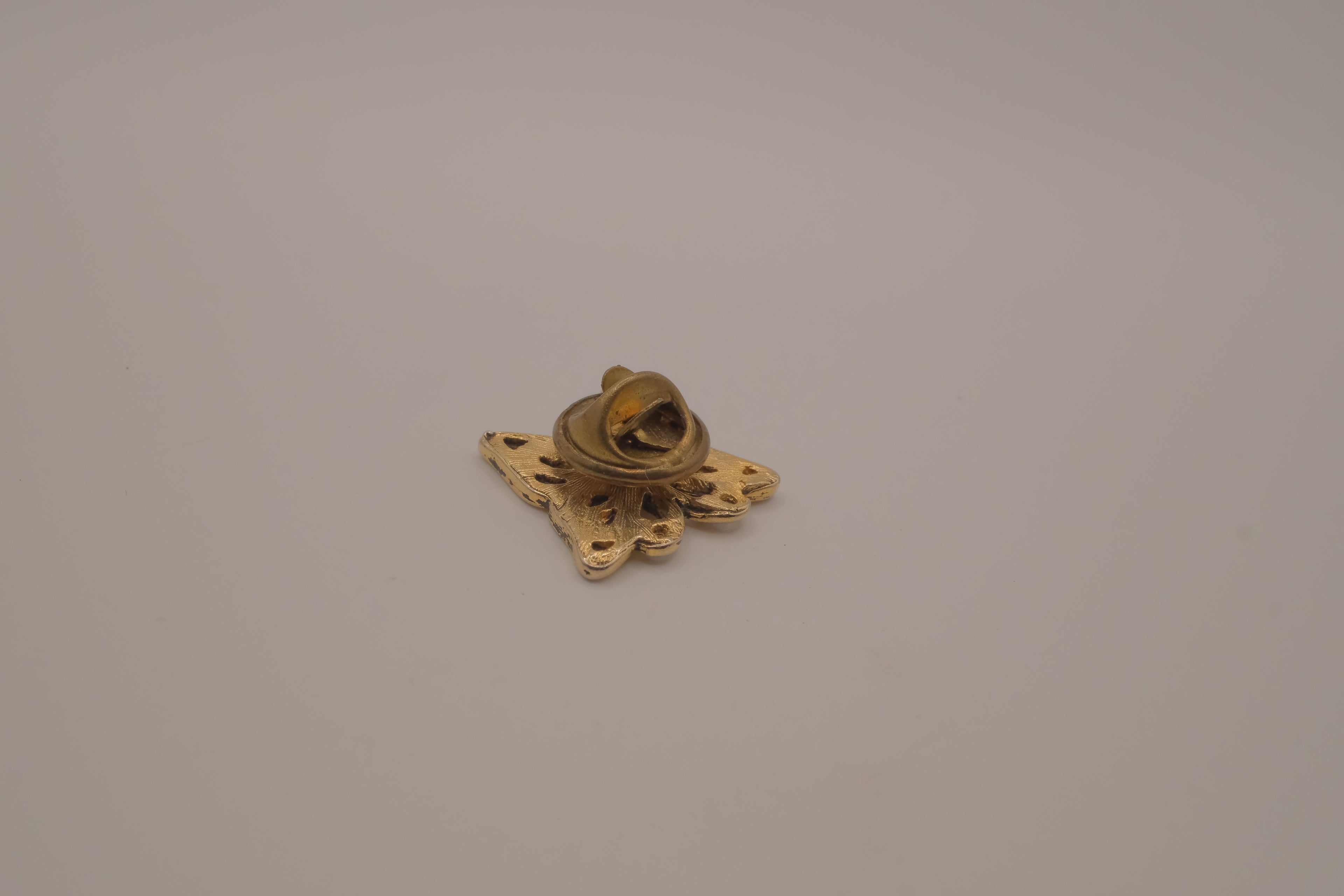 Antique gold butterfly bag pin