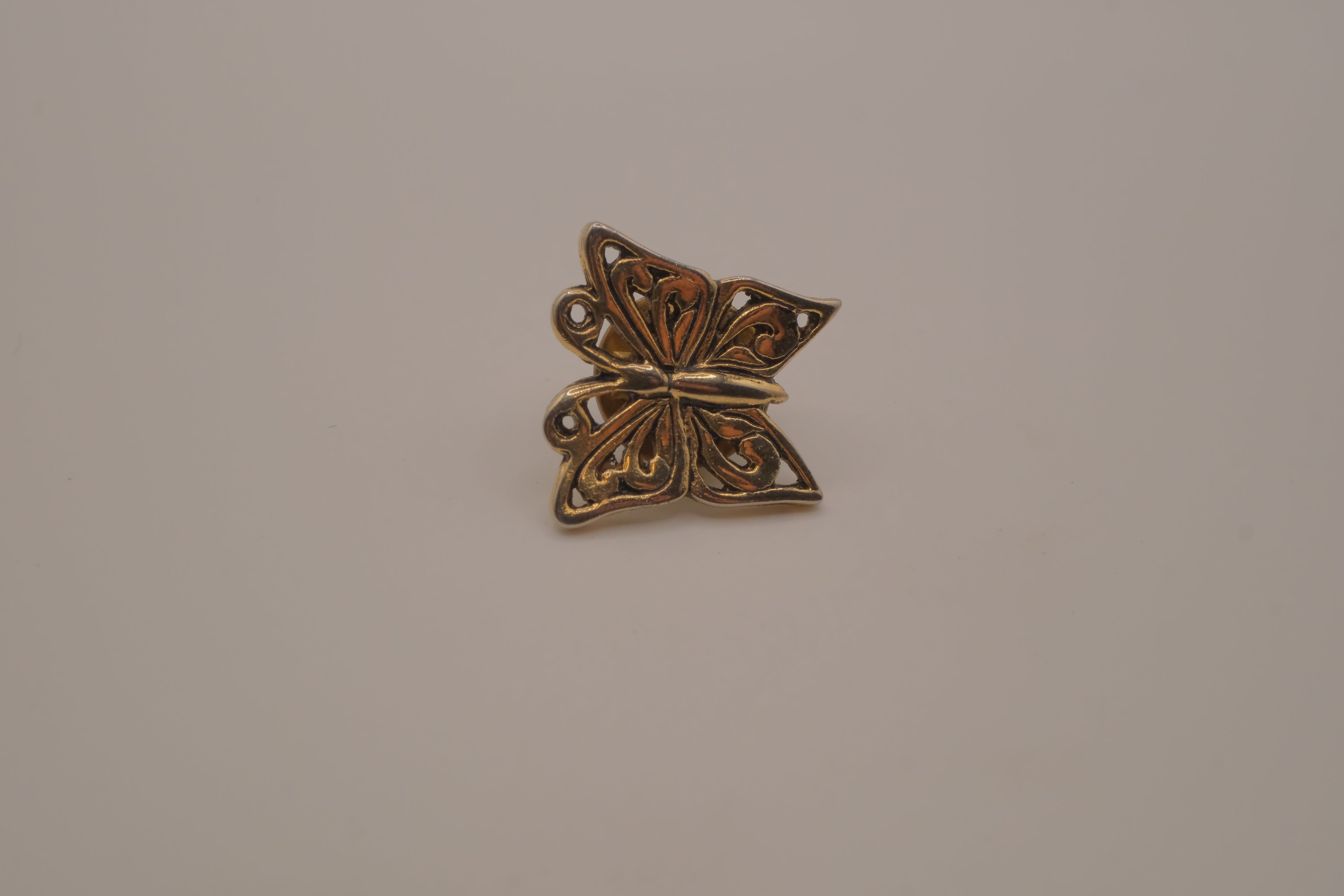 Antique gold butterfly bag pin