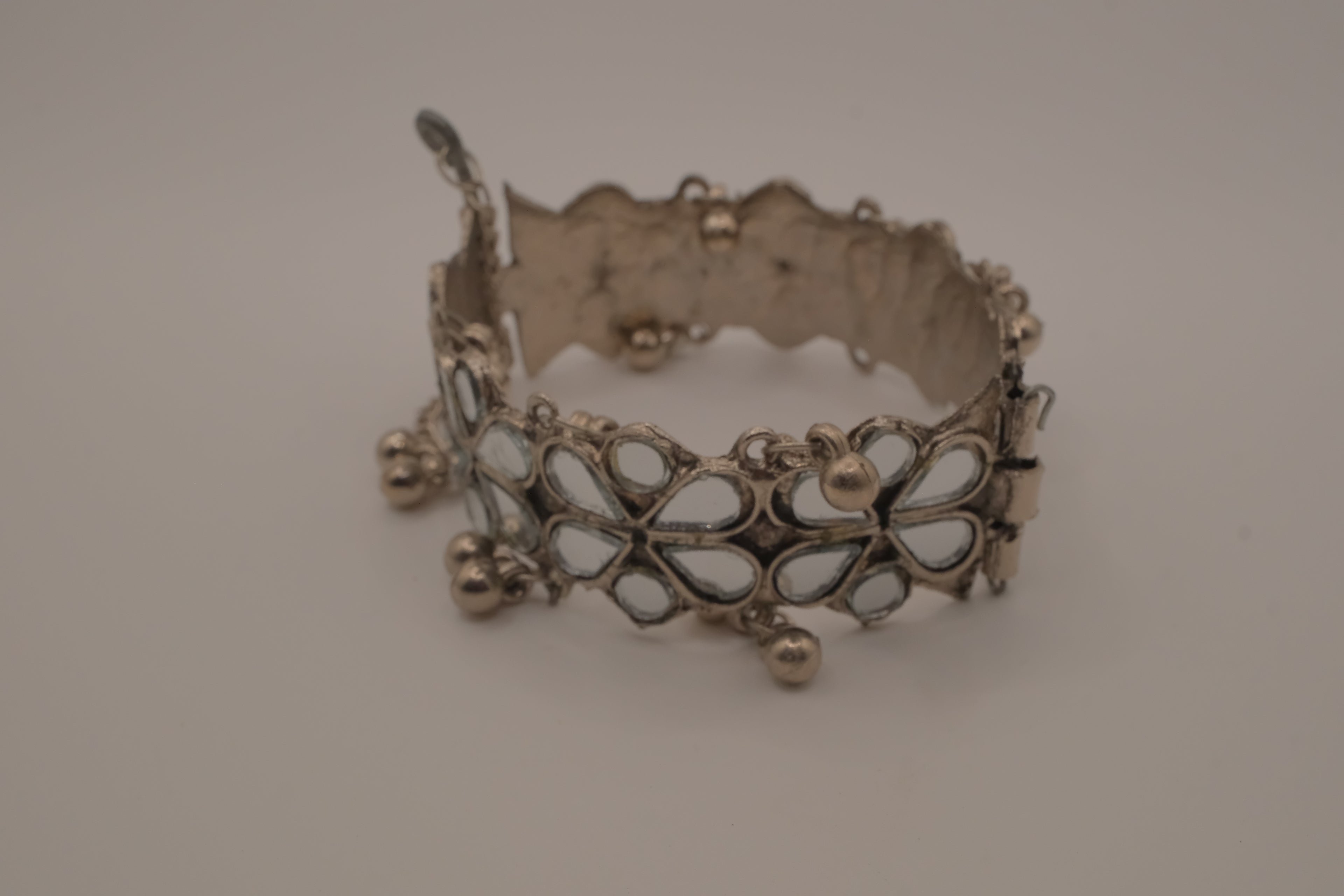 Silver Handcut Mirror and Ghungroo Studded Oxidised Cuff Bracelet