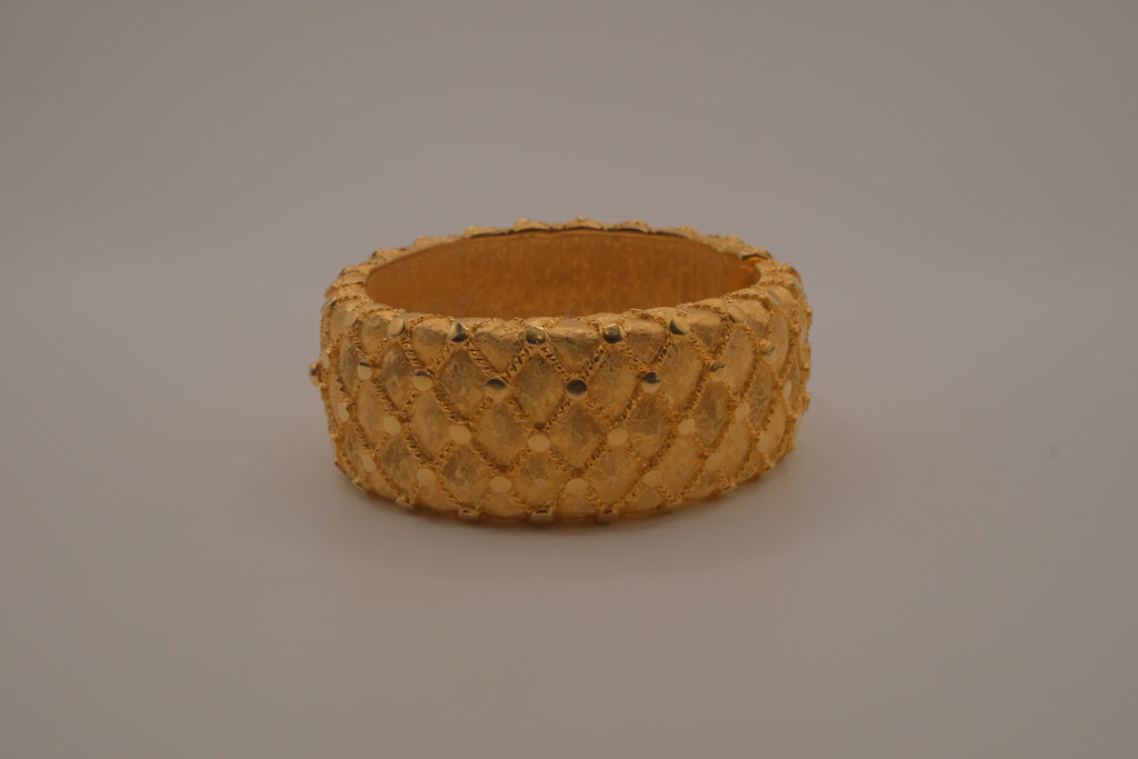 Avon gold textured quilted bangle bracelet