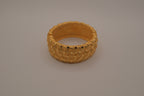 Avon gold textured quilted bangle bracelet