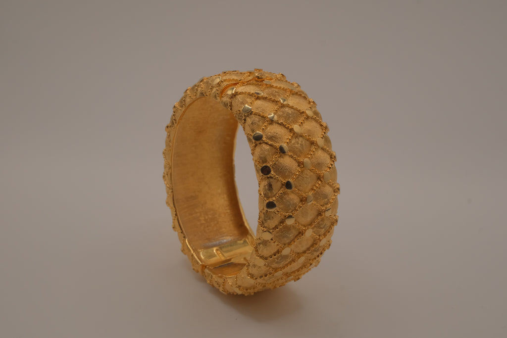Avon gold textured quilted bangle bracelet