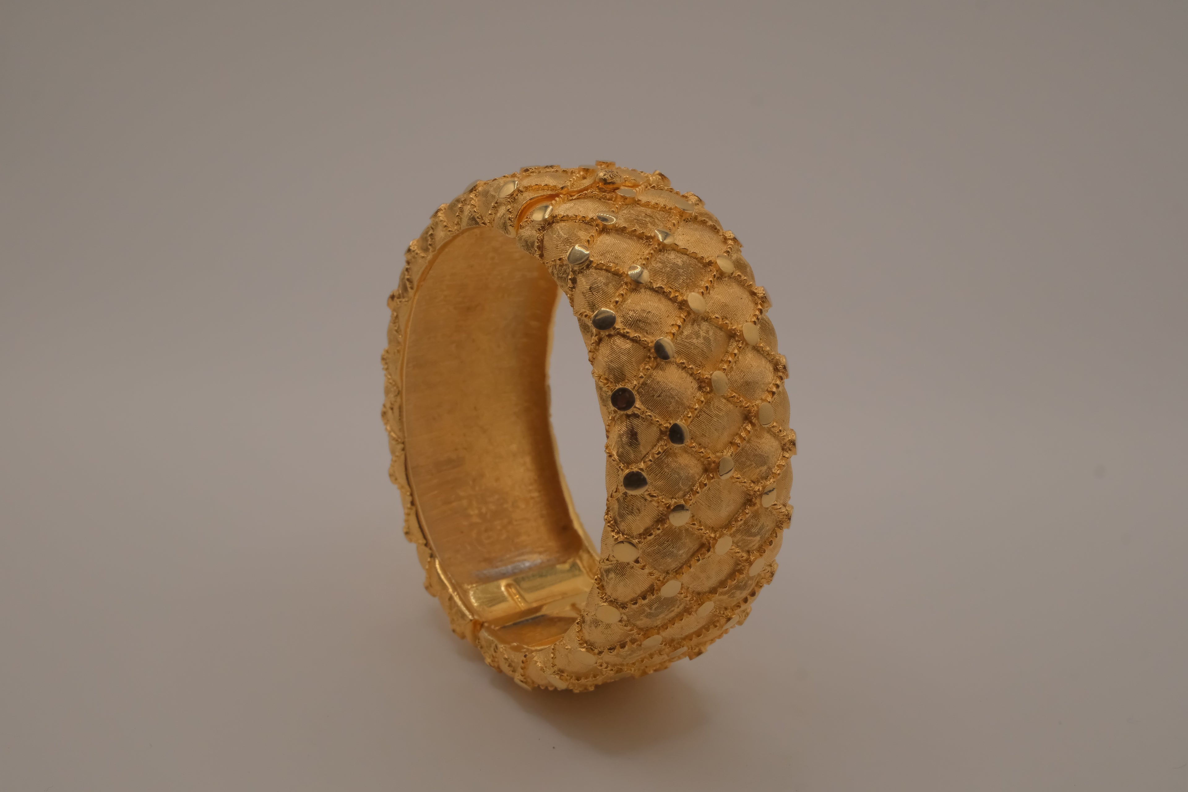 Avon gold textured quilted bangle bracelet