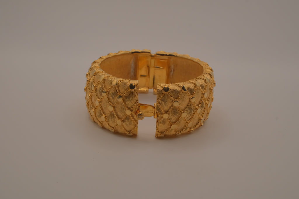 Avon gold textured quilted bangle bracelet