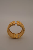 Avon gold textured quilted bangle bracelet