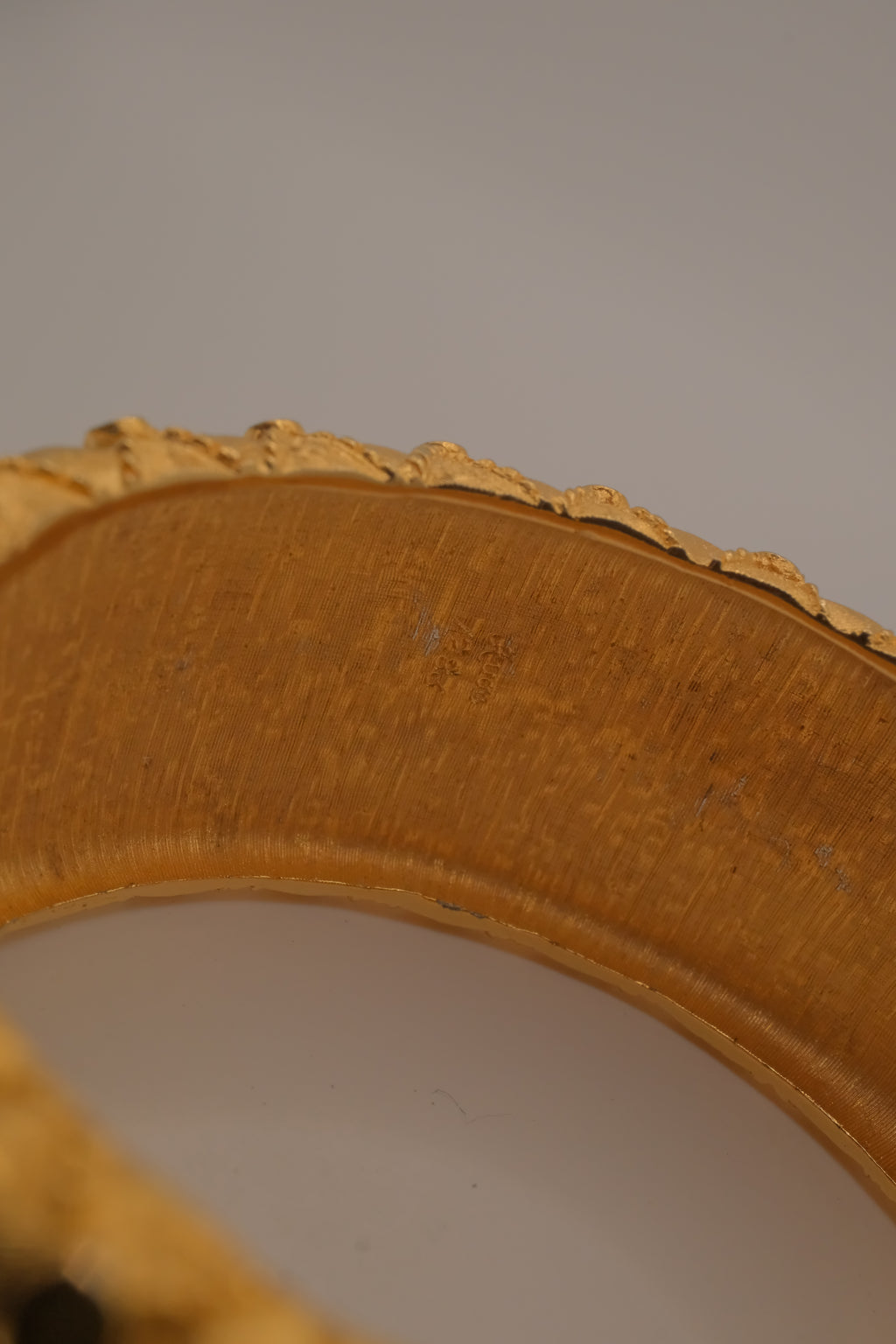 Avon gold textured quilted bangle bracelet