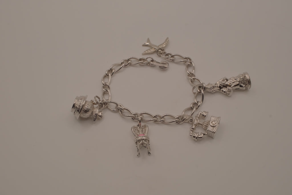 1973 Vintage Avon Charm Bracelet