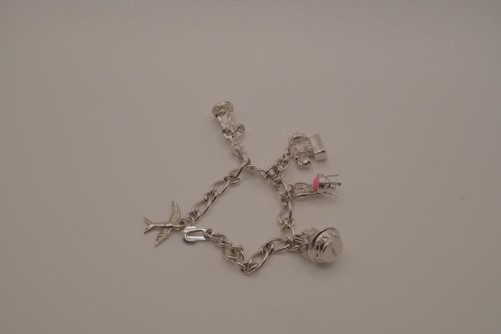 1973 Vintage Avon Charm Bracelet