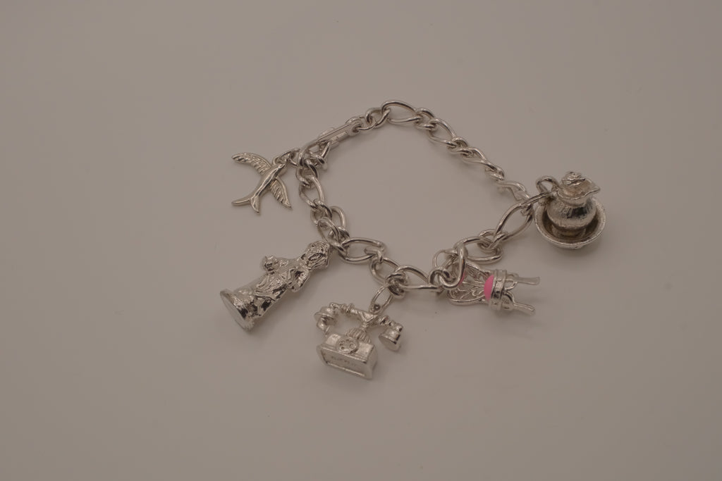 1973 Vintage Avon Charm Bracelet