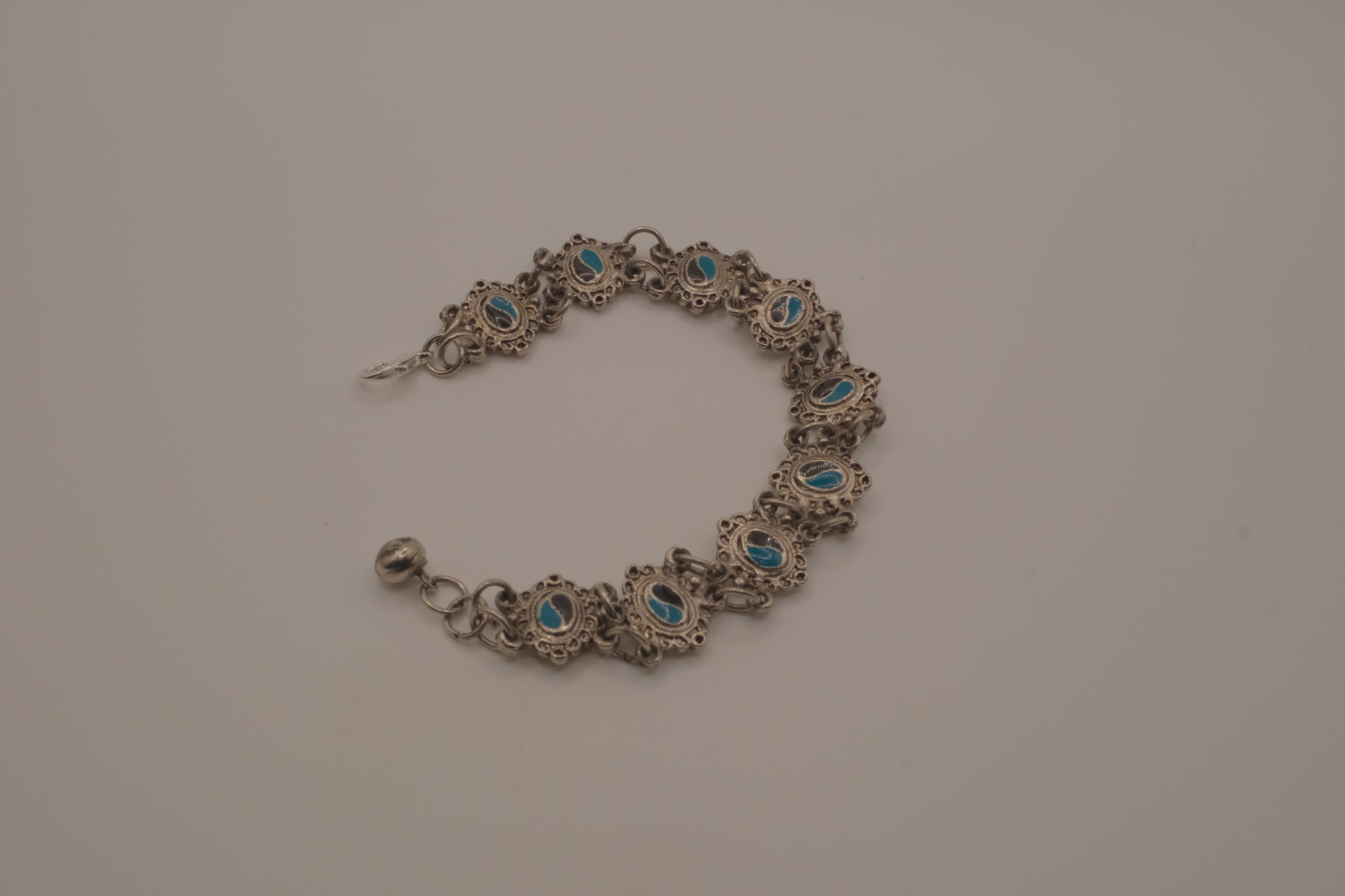 Vintage silver link bracelet inset with turquoise-colored settings
