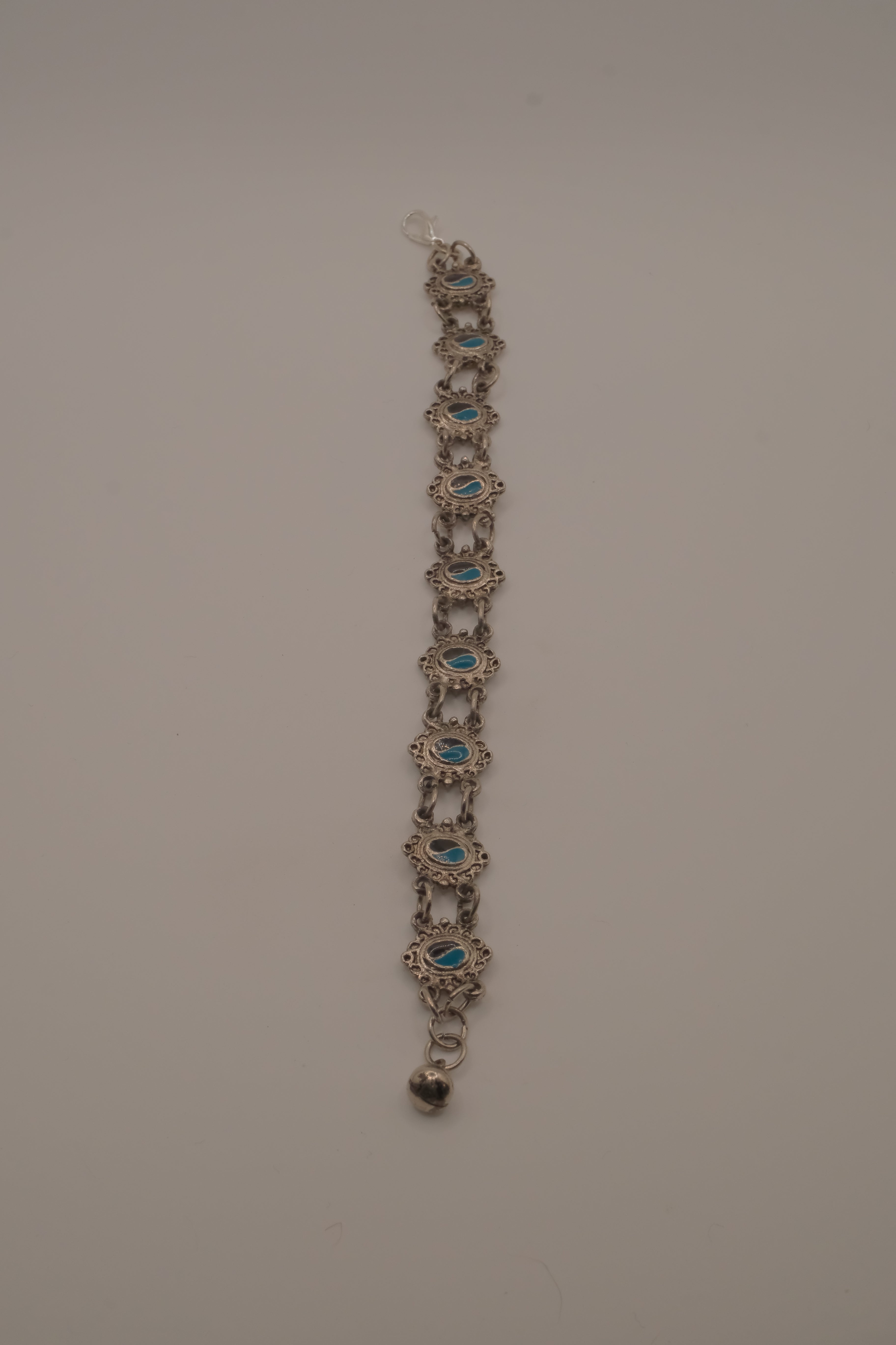 Vintage silver link bracelet inset with turquoise-colored settings