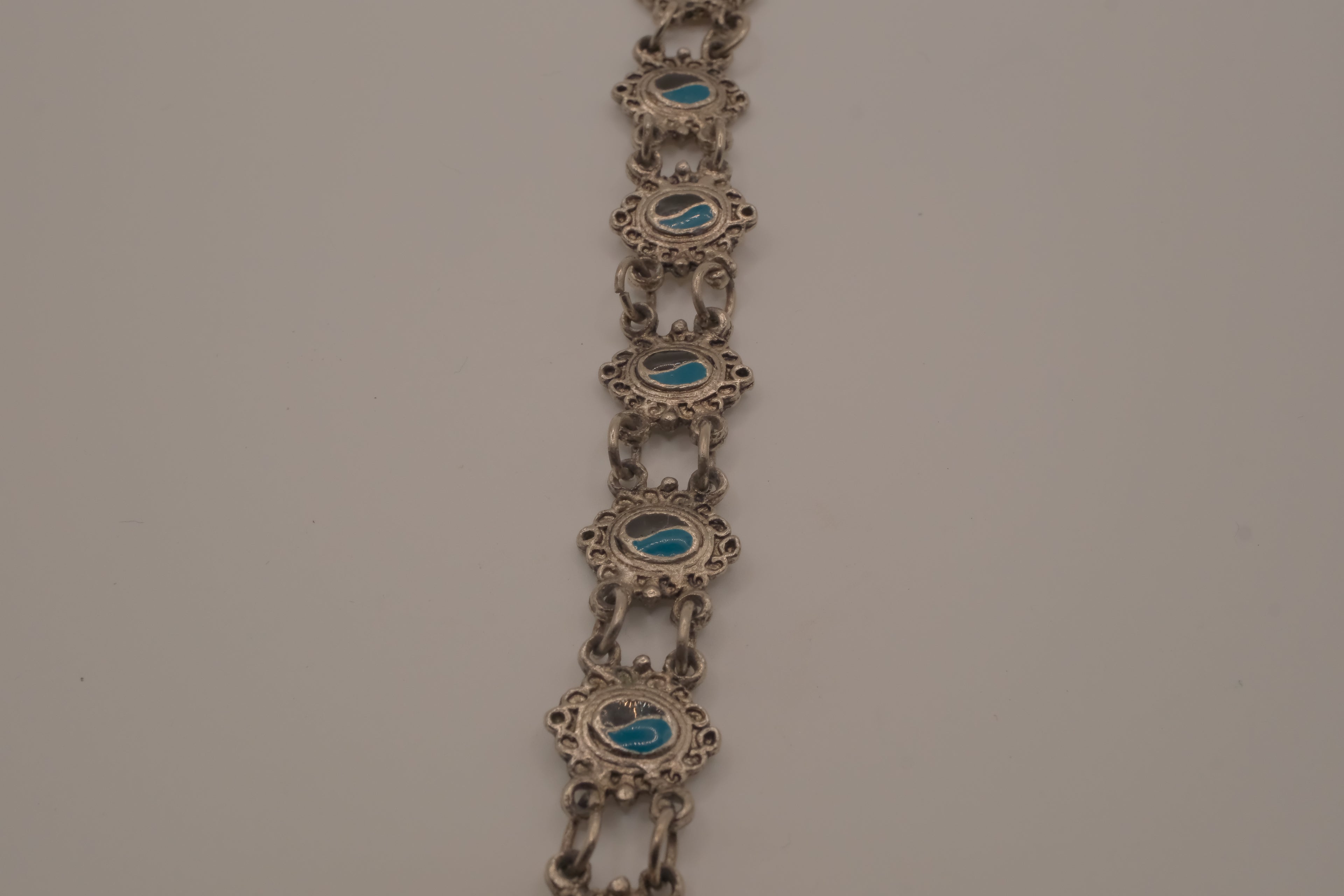 Vintage silver link bracelet inset with turquoise-colored settings