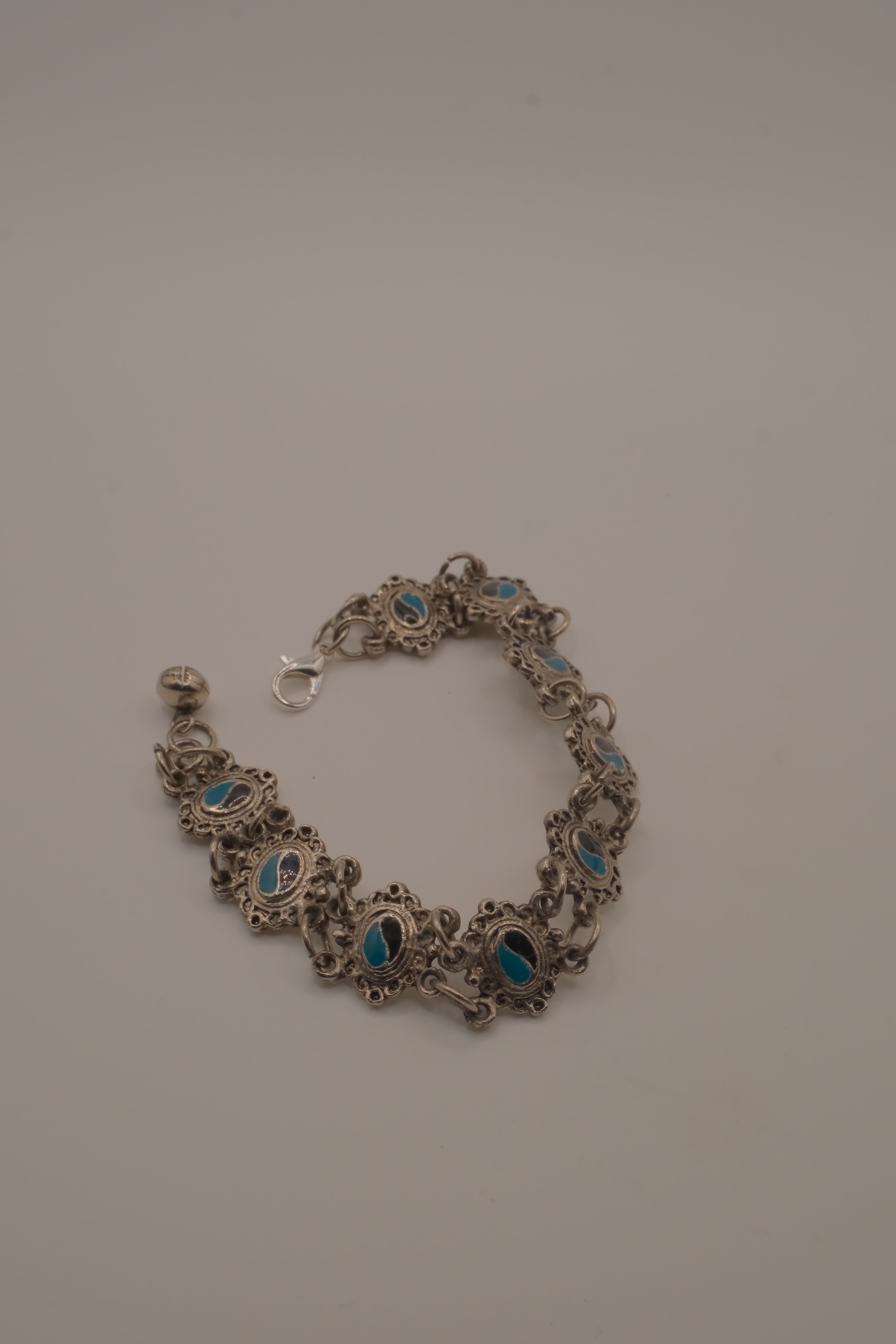 Vintage silver link bracelet inset with turquoise-colored settings