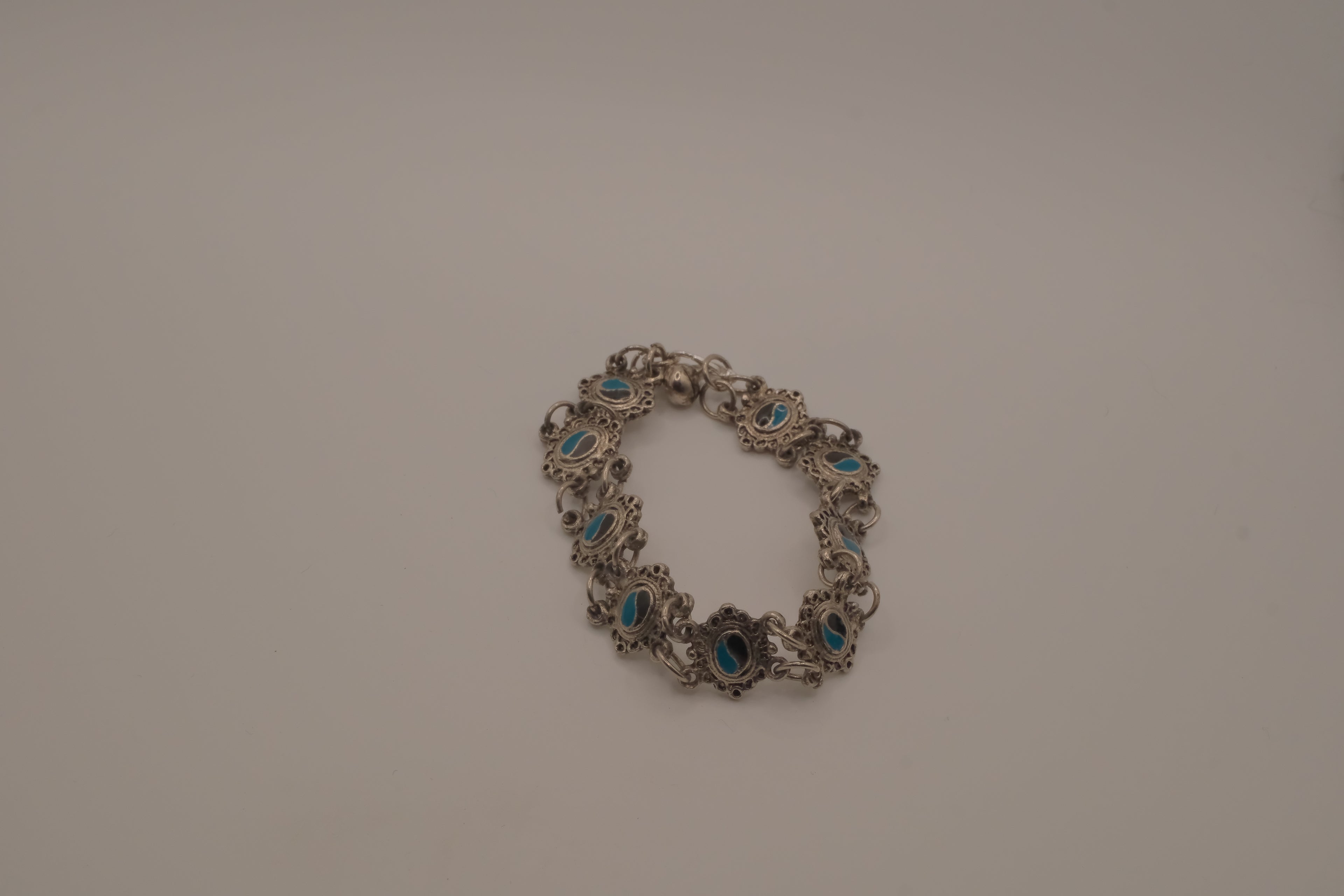 Vintage silver link bracelet inset with turquoise-colored settings