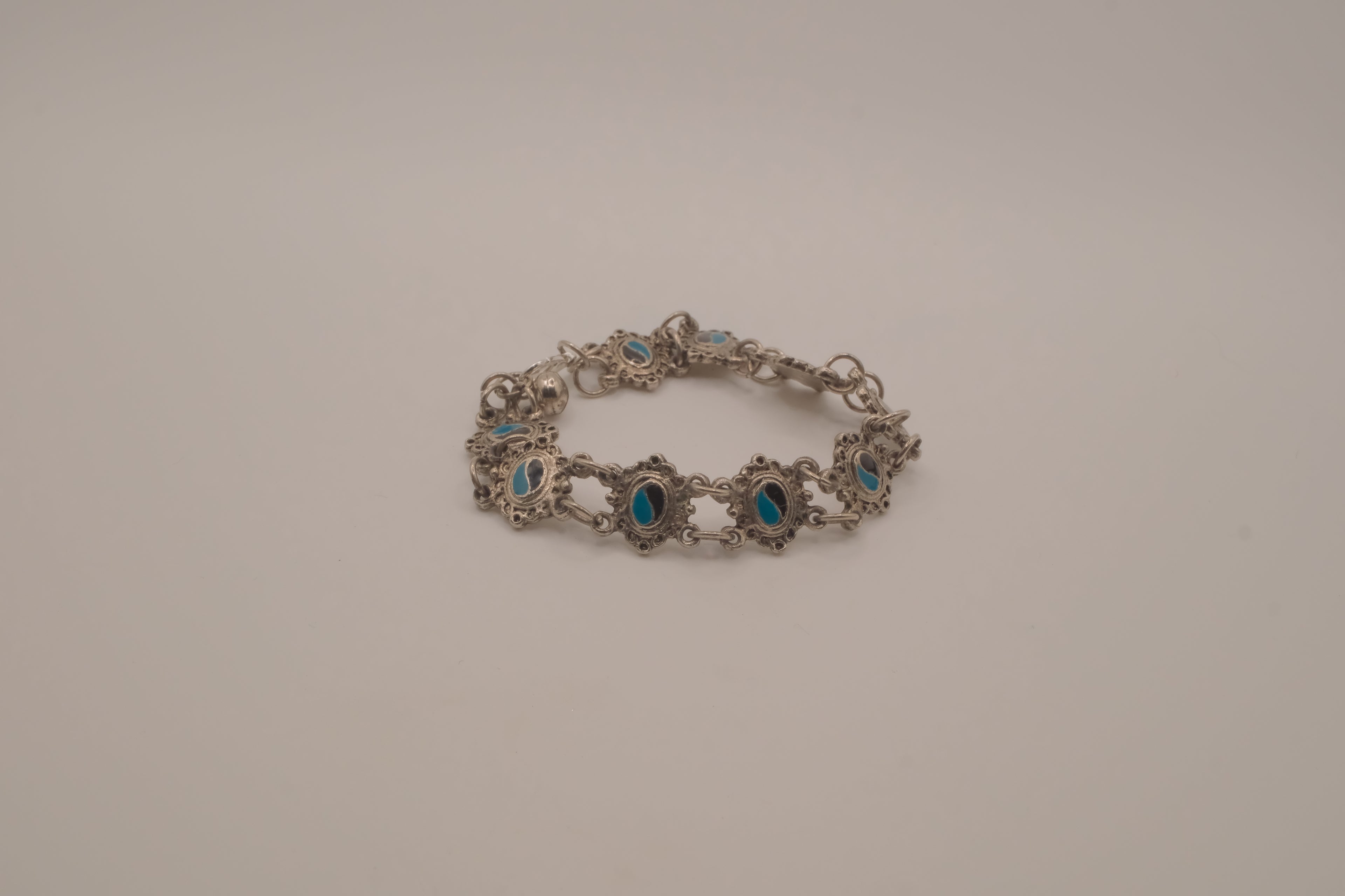 Vintage silver link bracelet inset with turquoise-colored settings