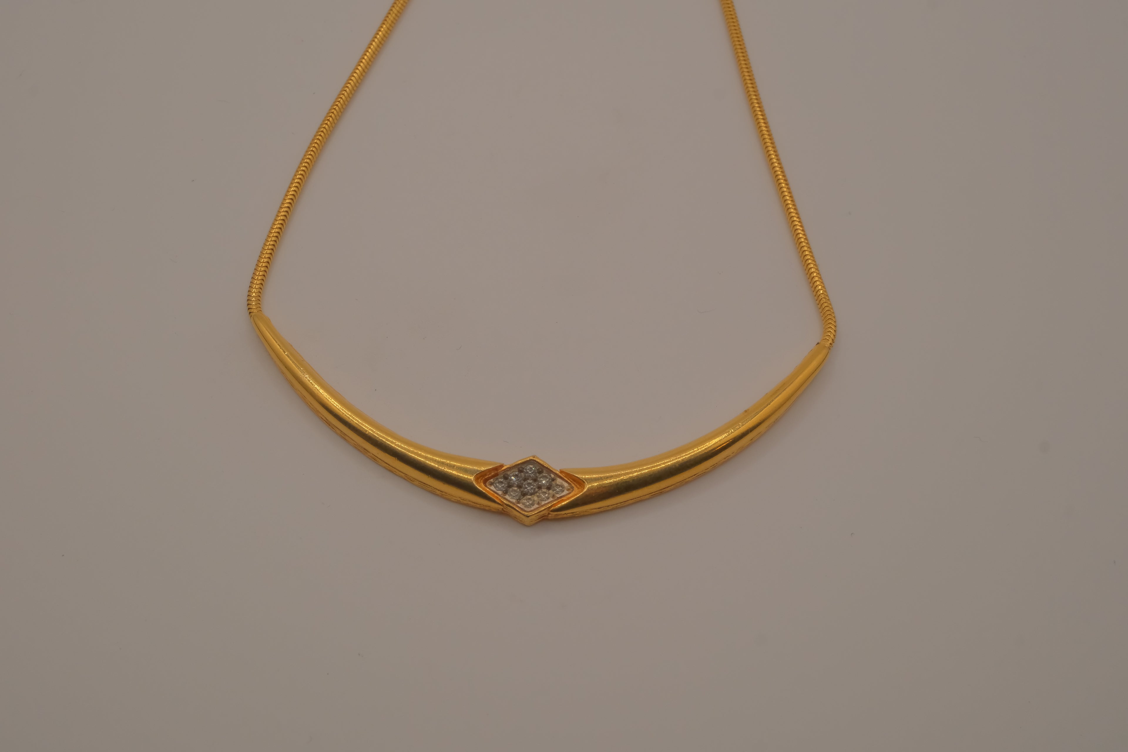 Vintage gold-toned rigid center necklace