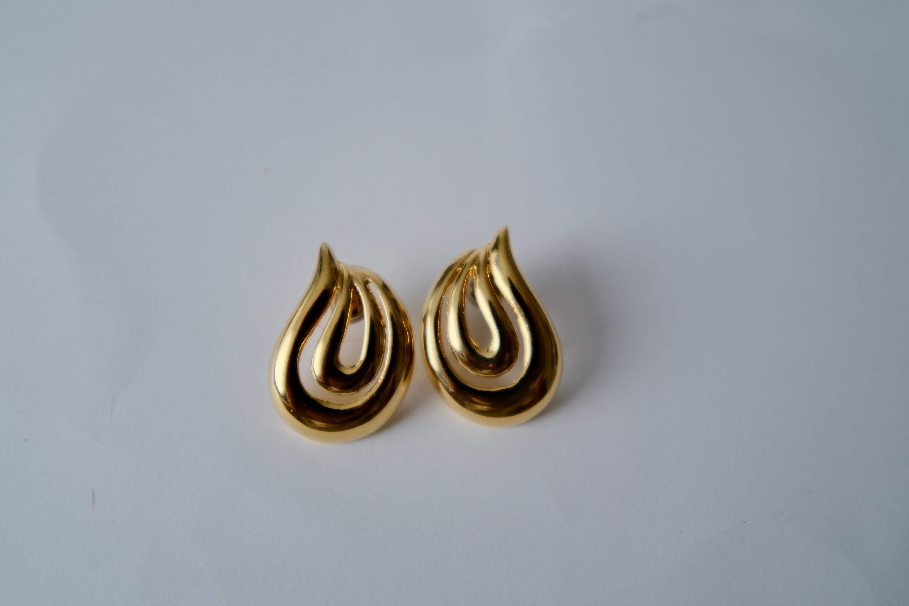 Vintage gold-toned swirl studded earrings