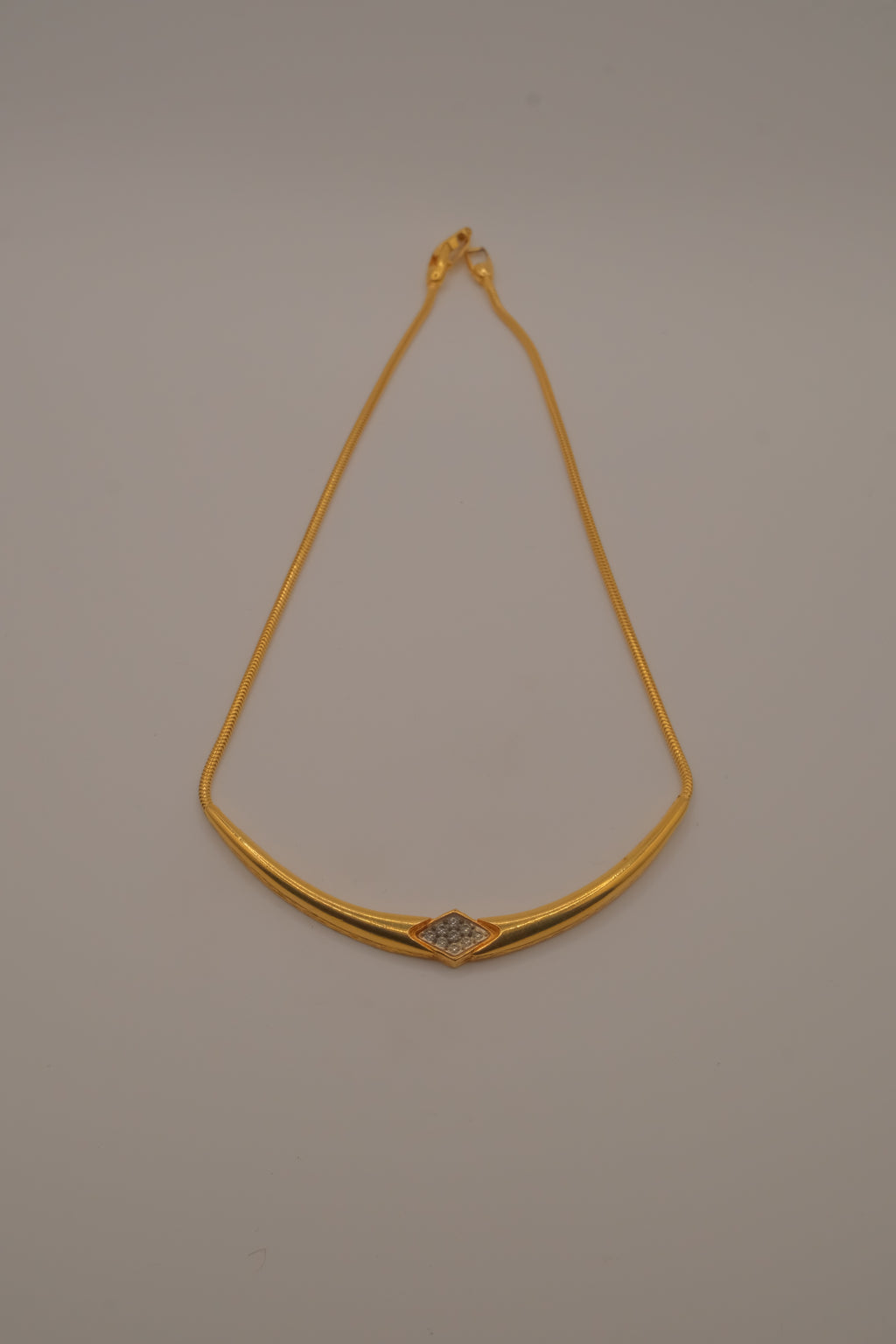 Vintage gold-toned rigid center necklace